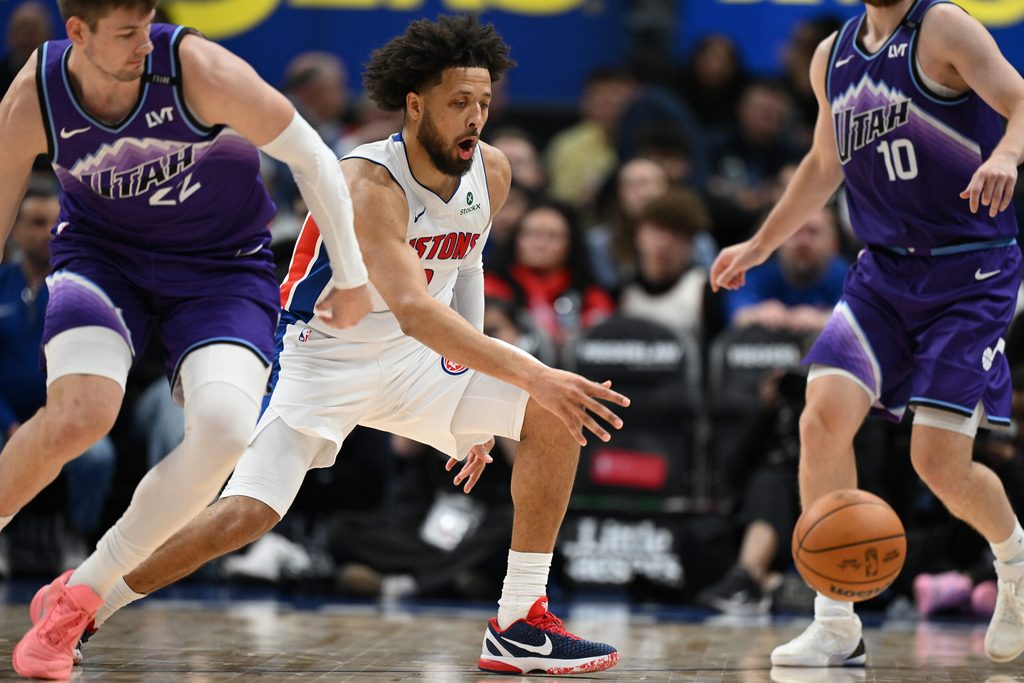 Nov 5, 2025; Detroit, Michigan, USA; Detroit Pistons guard Cade Cunningham (2) steals the ball from Utah Jazz forward Kyle Filipowski (22) in the fourth quarter at Little Caesars Arena. Mandatory Credit: Lon Horwedel-Imagn Images