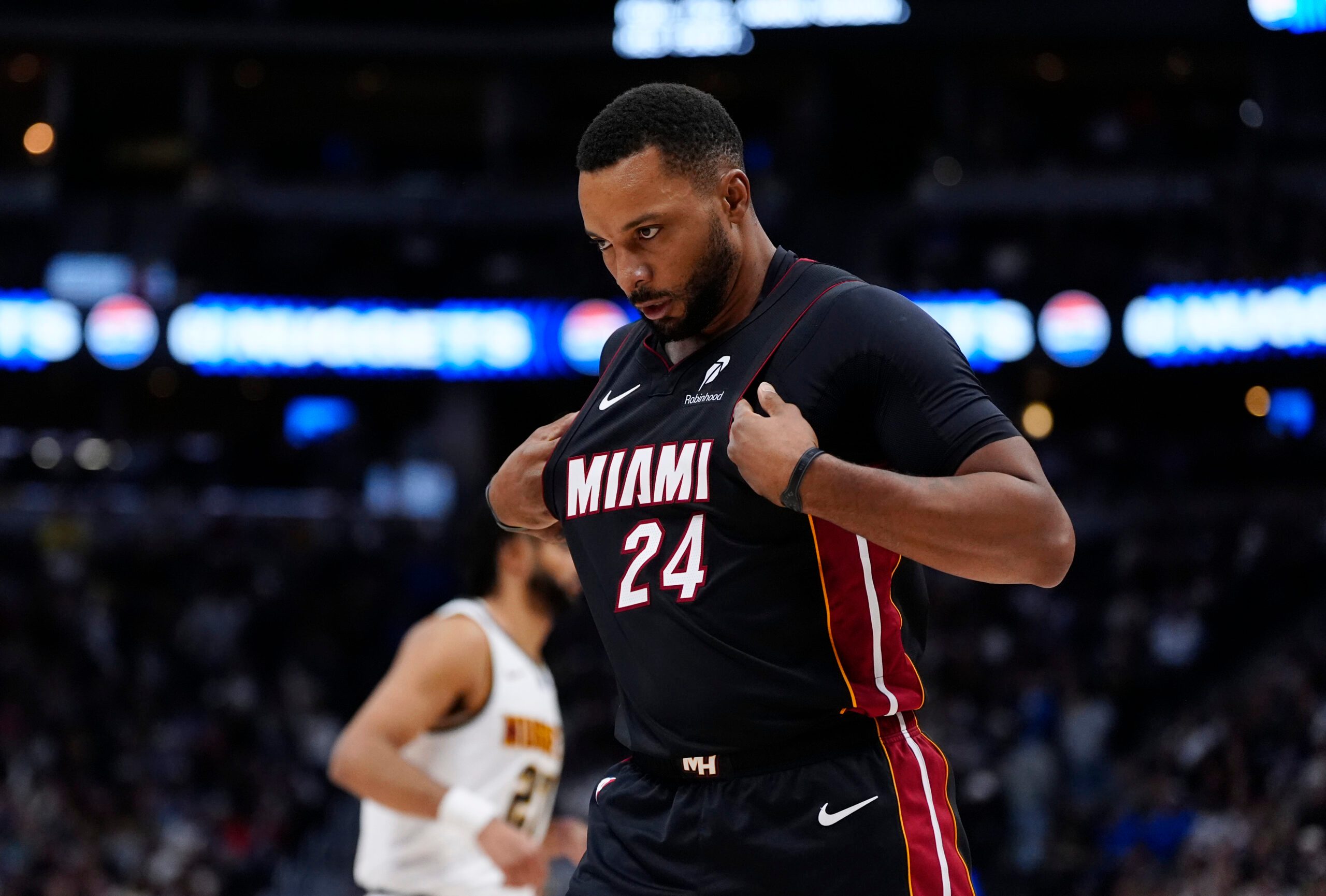 Nov 5, 2025; Denver, Colorado, USA; Miami Heat guard Norman Powell (24) reacts during the second half against the Denver Nuggets at Ball Arena. Mandatory Credit: Ron Chenoy-Imagn Images