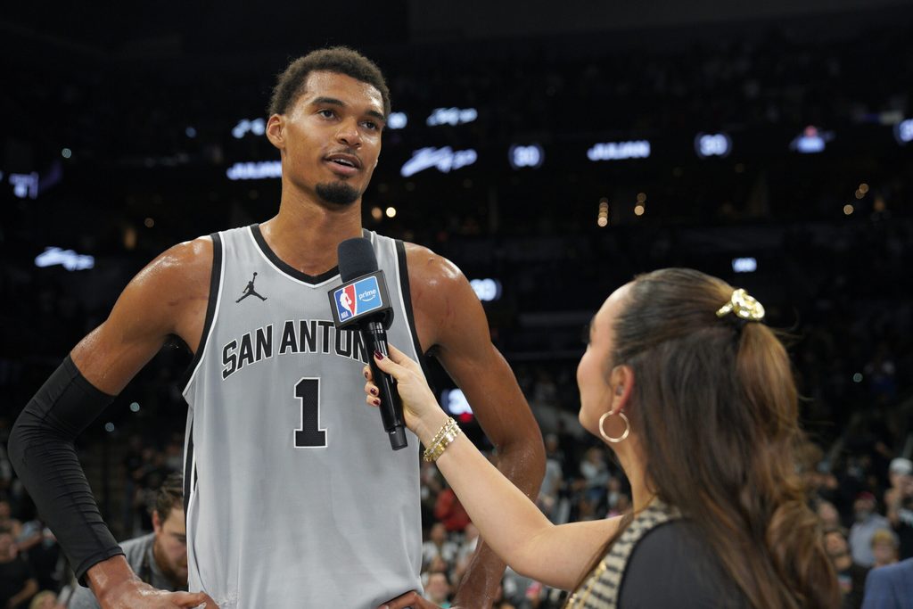 Nov 7, 2025; San Antonio, Texas, USA; San Antonio Spurs forward Victor Wembanyama (1) talks to media after a 121-110 win against the Houston Rockets at Frost Bank Center. Mandatory Credit: Dustin Safranek-Imagn Images