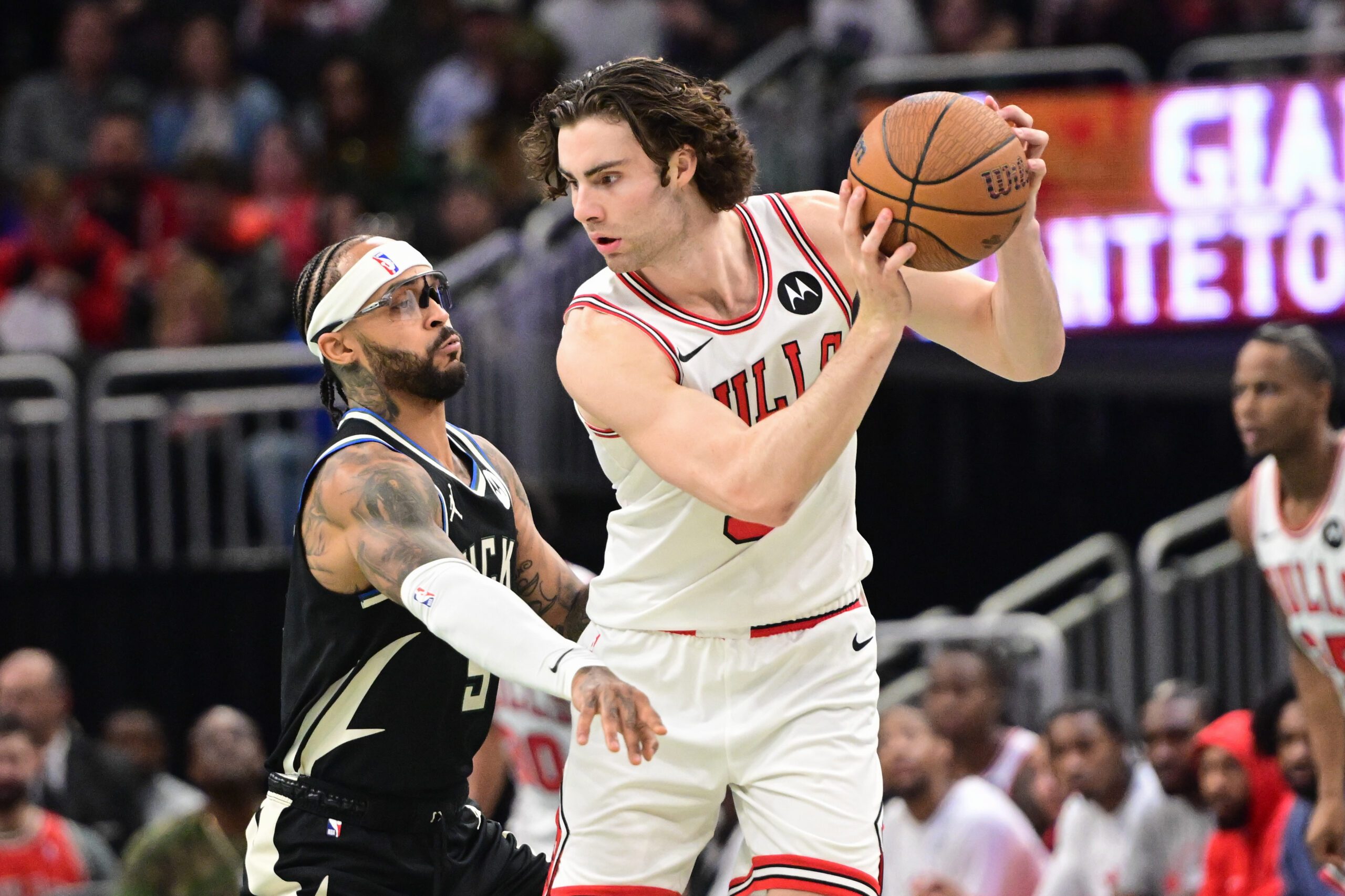 Nov 7, 2025; Milwaukee, Wisconsin, USA; Chicago Bulls guard Josh Giddey (3) looks for a shot against Milwaukee Bucks guard Gary Trent Jr. (5) in the 3rd quarter at Fiserv Forum. Mandatory Credit: Benny Sieu-Imagn Images