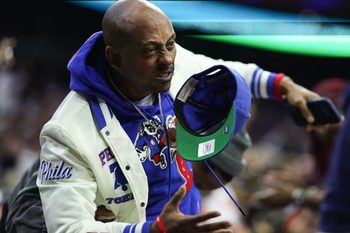 Nov 9, 2025; Philadelphia, Pennsylvania, USA; Podcaster and entertainer Gillie Da King reacts after a Philadelphia 76ers score against the Detroit Pistons during the fourth quarter at Xfinity Mobile Arena. Mandatory Credit: Bill Streicher-Imagn Images