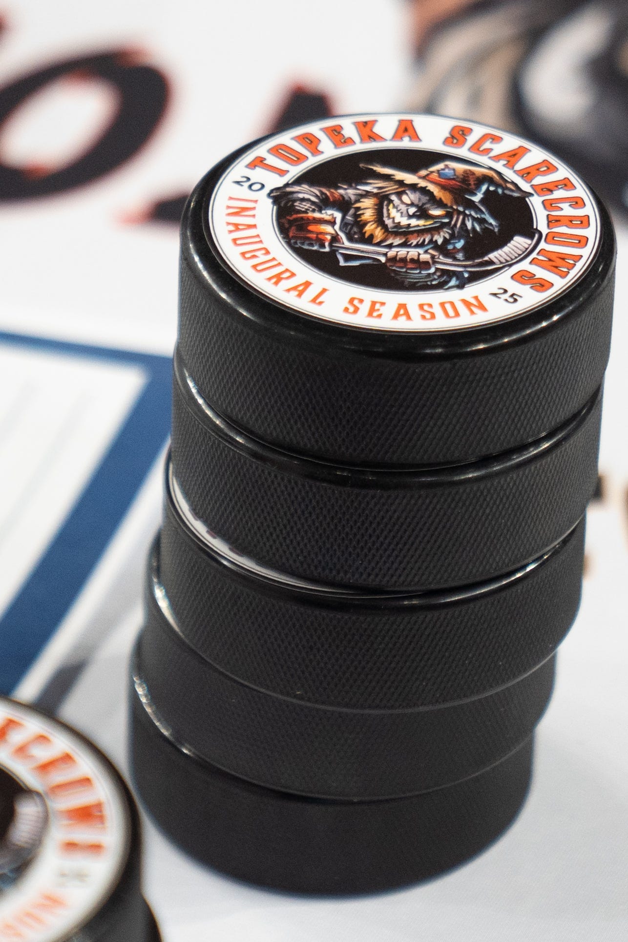 Special edition inaugural season Topeka Scarecrows pucks are sold to those present at a press conference at the Stormont Vail Events Center on May 5, 2025.