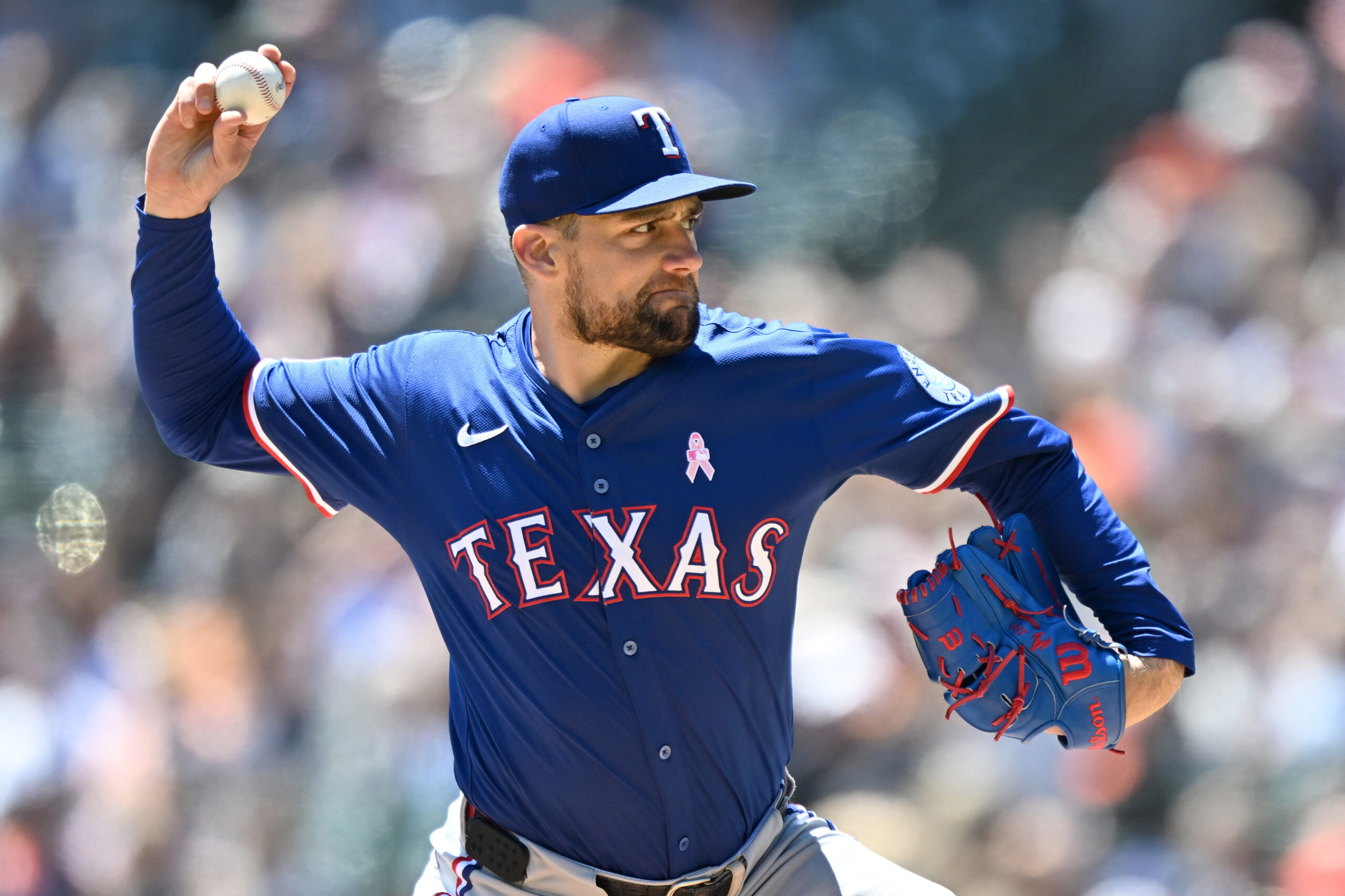 May 11, 2025; Detroit, Michigan, USA; Texas Rangers starting pitcher Nathan Eovaldi (17) throws a pitch against the Detroit Tigers in the first inning at Comerica Park. Mandatory Credit: Lon Horwedel-Imagn Images