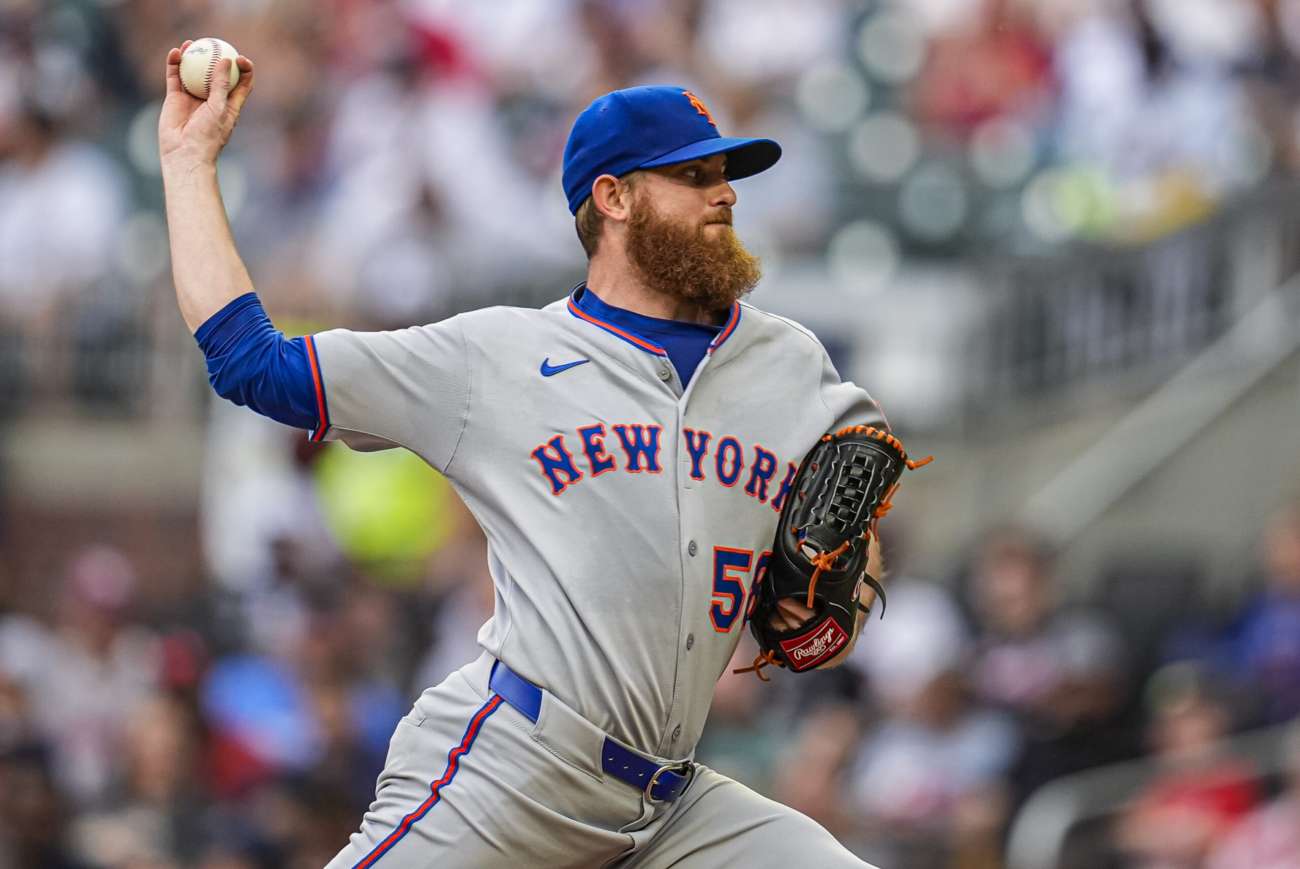 Jun 18, 2025; Cumberland, Georgia, USA; New York Mets starting pitcher Paul Blackburn (58) pitches against the Atlanta Braves during the first inning at Truist Park. Mandatory Credit: Dale Zanine-Imagn Images