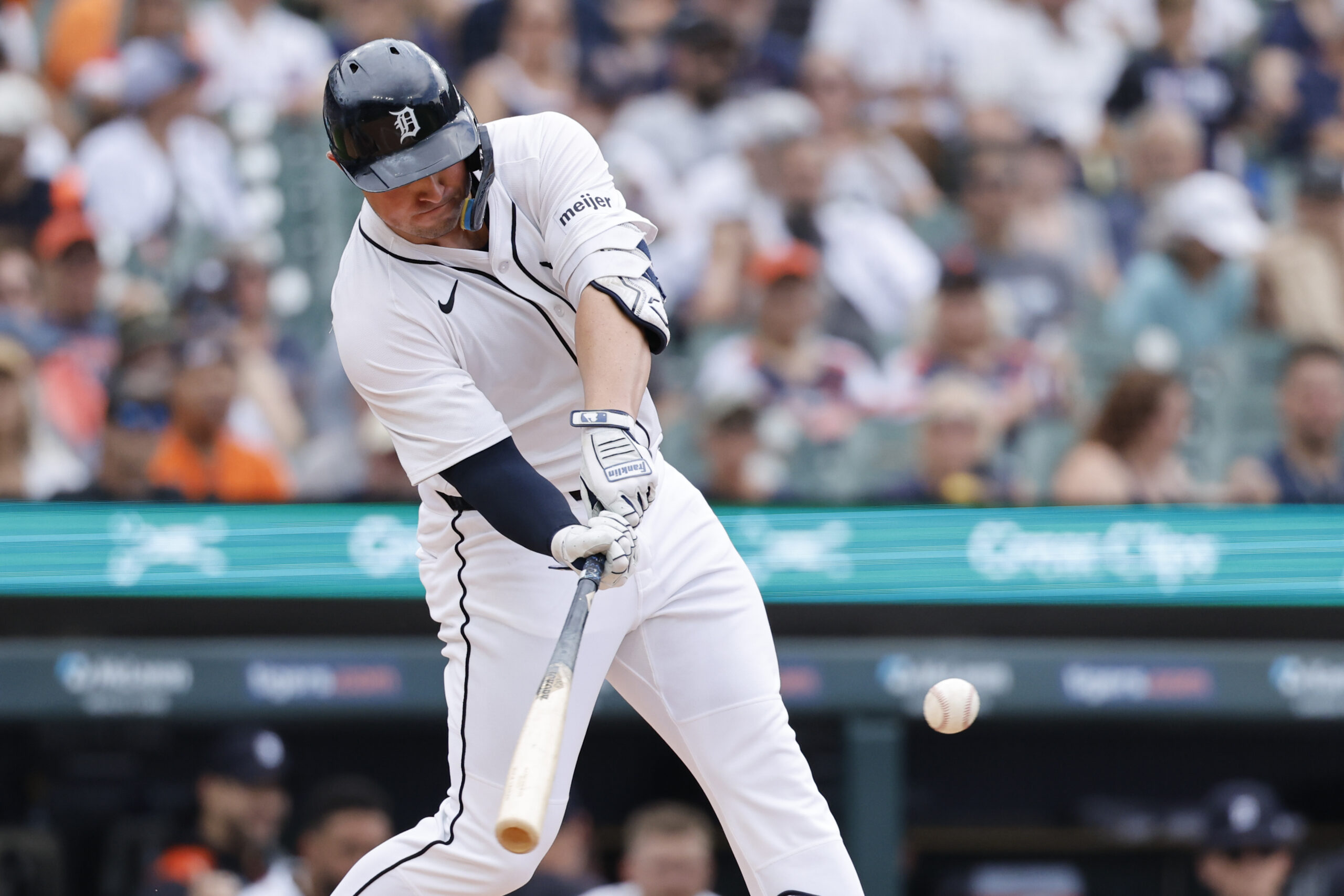 Jun 26, 2025; Detroit, Michigan, USA;  Detroit Tigers first base Spencer Torkelson (20) hits a home run in the first inning against the Athletics at Comerica Park. Mandatory Credit: Rick Osentoski-Imagn Images