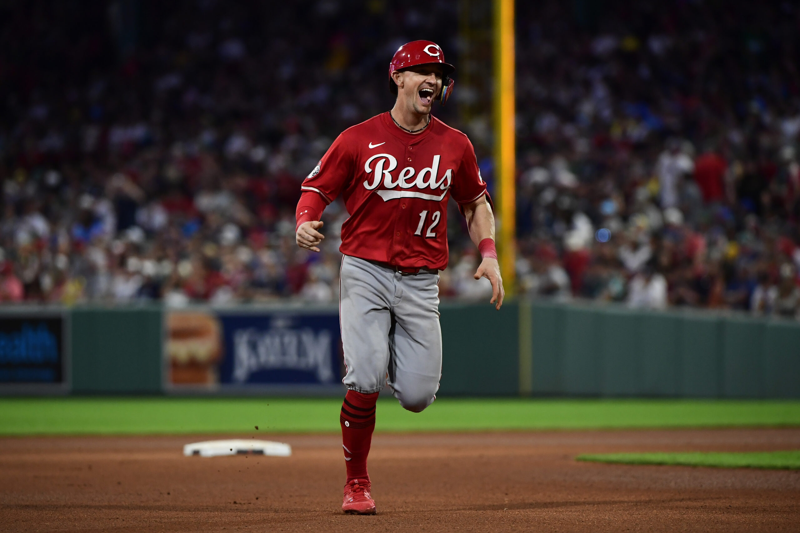 Jun 30, 2025; Boston, Massachusetts, USA; Cincinnati Reds designated hitter Austin Hays (12) reacts while rounding the bases after hitting a home run during the sixth inning against the Boston Red Sox at Fenway Park. Mandatory Credit: Bob DeChiara-Imagn Images