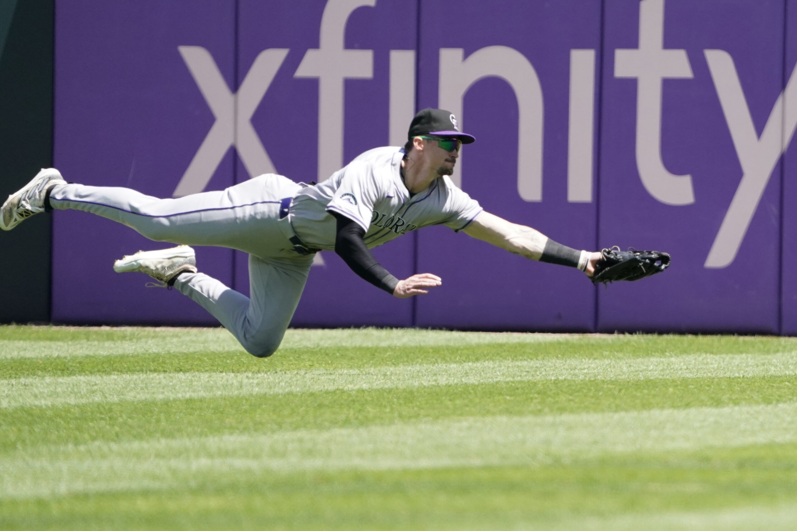 Jun 30, 2024; Chicago, Illinois, USA; Colorado Rockies outfielder Brenton Doyle (9) makes a catch against Chicago White Sox outfielder Luis Robert Jr. (not pictured) during the sixth inning at Guaranteed Rate Field. Mandatory Credit: David Banks-Imagn Images