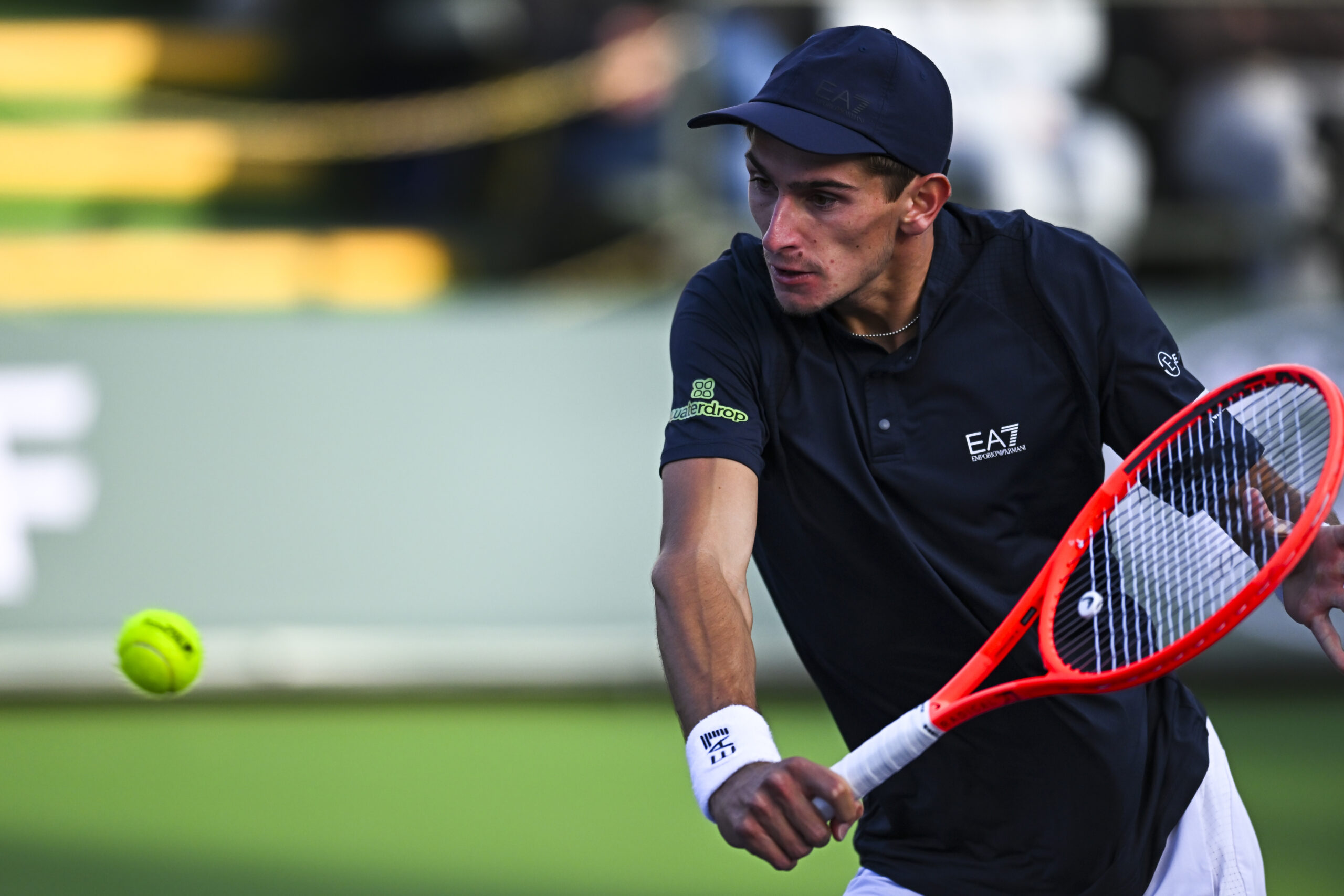 Mar 6, 2025; Indian Wells, CA, USA; Matteo Arnaldi (ITA) hits a ball against Aleksander Kovacevic (USA) in the BNP Paribas Open at the Indian Well Tennis Garden. Mandatory Credit: Jonathan Hui-Imagn Images