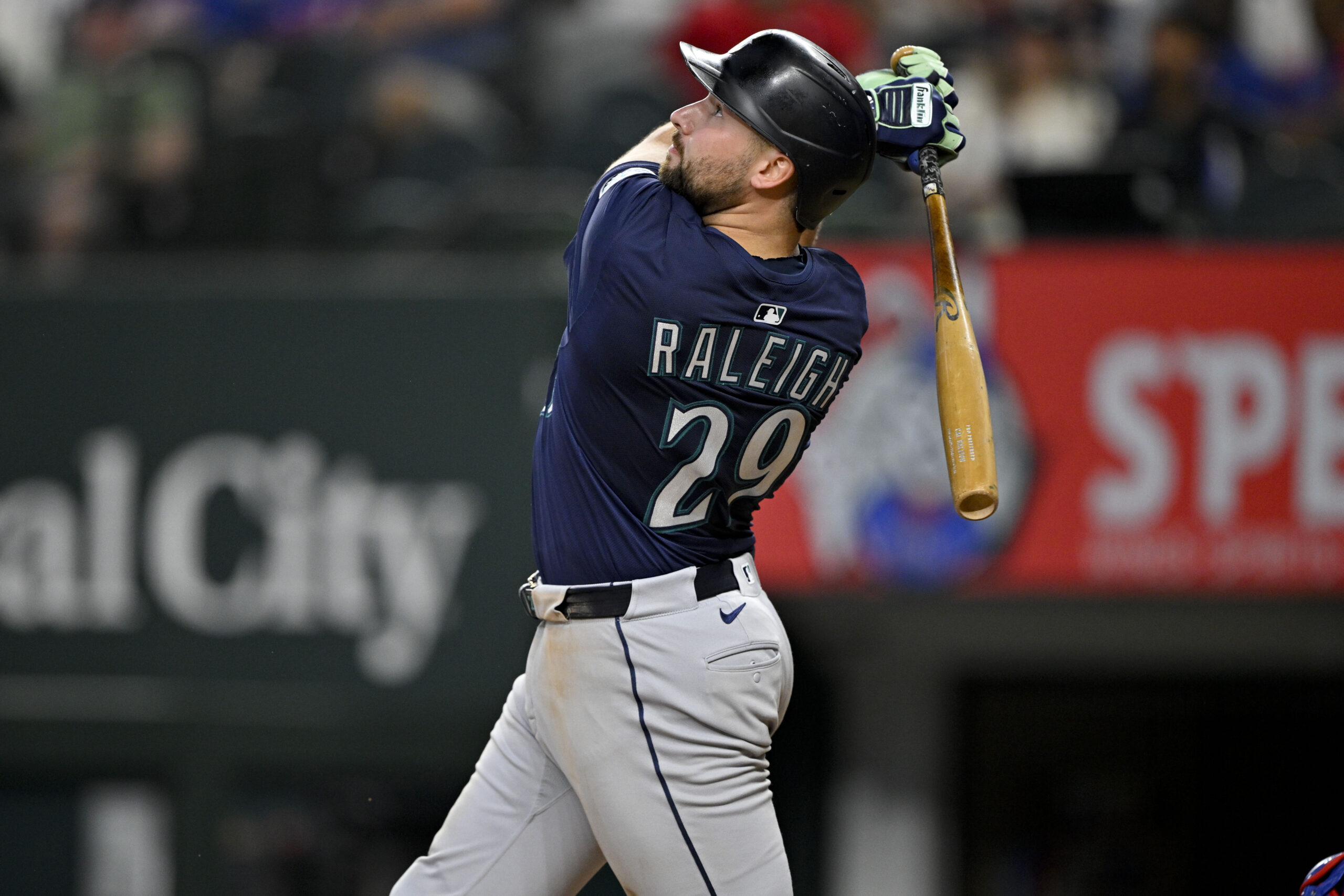 Jun 28, 2025; Arlington, Texas, USA; Seattle Mariners catcher Cal Raleigh (29) bats during the game between the Texas Rangers and the Seattle Mariners at Globe Life Field. Mandatory Credit: Jerome Miron-Imagn Images