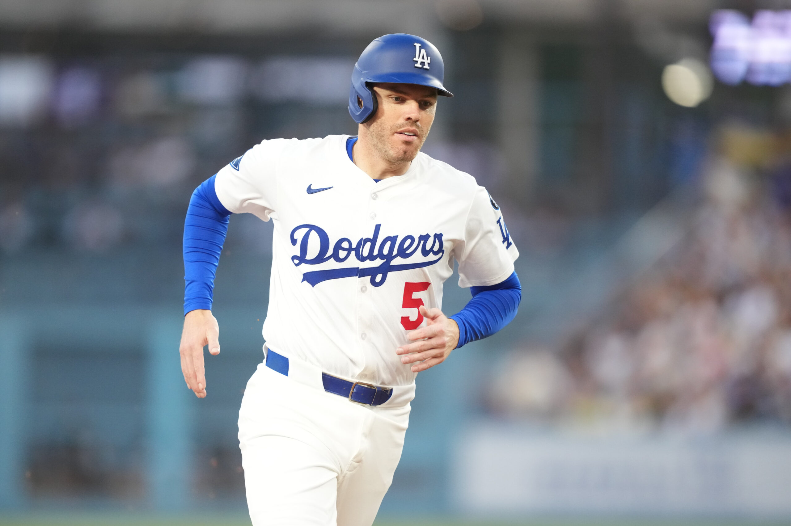 Jul 3, 2025; Los Angeles, California, USA; Los Angeles Dodgers first baseman Freddie Freeman (5) rounds the bases after Los Angeles Dodgers left fielder Michael Conforto (23) hits a two run home run during the third inning against the Chicago White Sox at Dodger Stadium. Mandatory Credit: Kirby Lee-Imagn Images