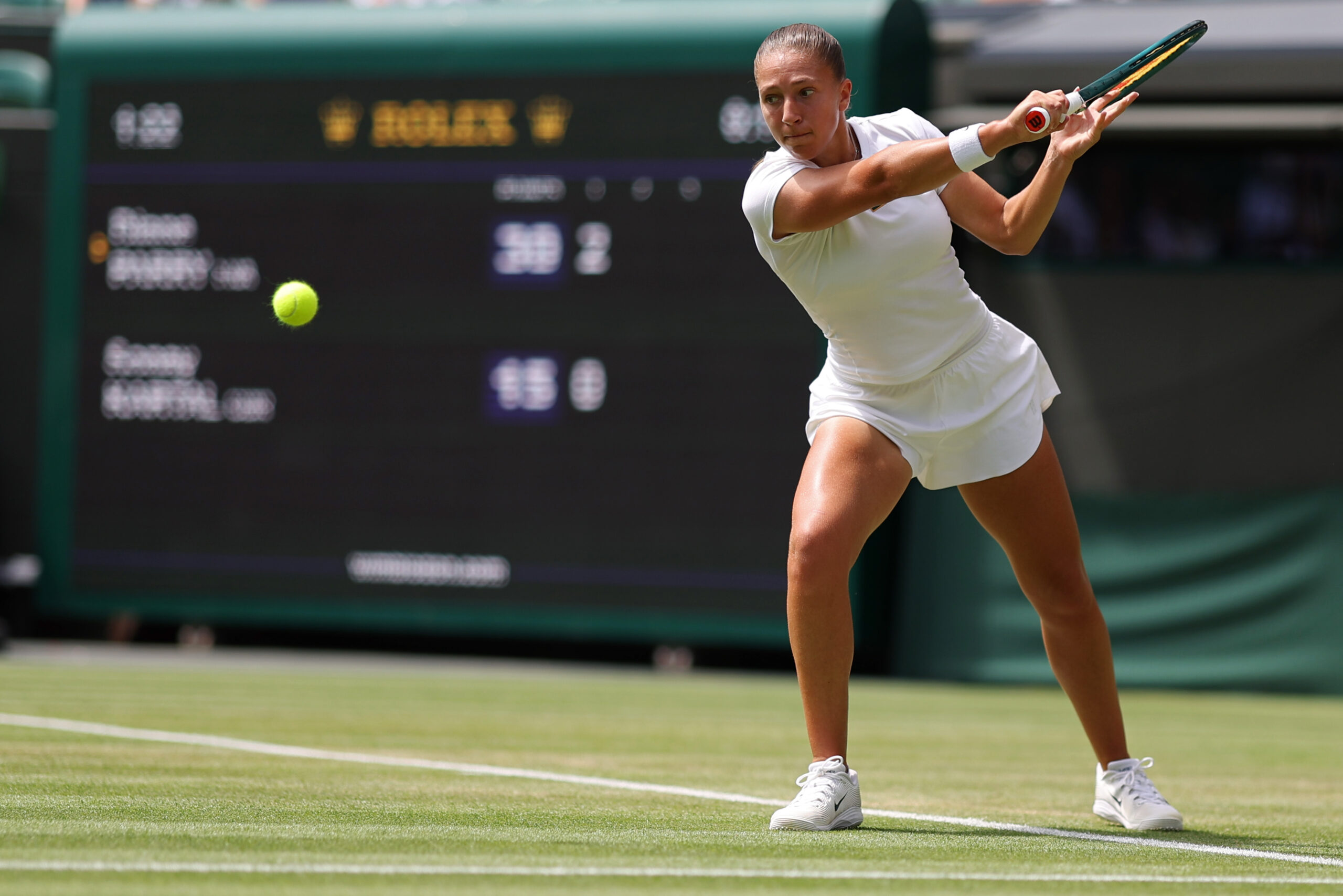 Jul 4, 2025; Wimbledon, United Kingdom; Diane Parry (FRA) hits a backhand against Sonay Kartal (GBR)(not pictured) on day five of The Championships Wimbledon 2025 at All England Lawn Tennis and Croquet Club. Mandatory Credit: Geoff Burke-Imagn Images