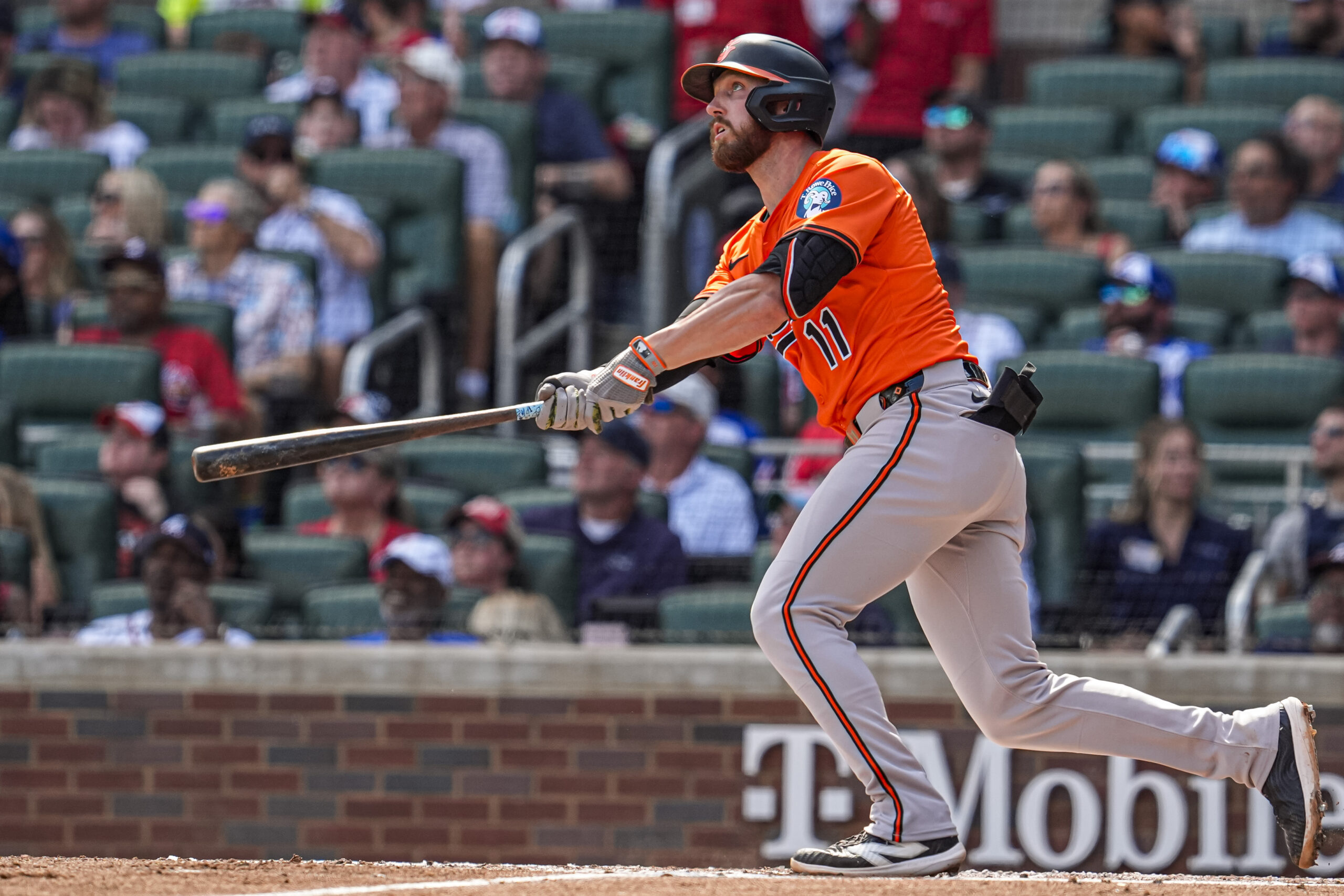 Jul 5, 2025; Cumberland, Georgia, USA; Baltimore Orioles third baseman Jordan Westburg (11) hits a two run home run against the Atlanta Braves during the third inning at Truist Park. Mandatory Credit: Dale Zanine-Imagn Images