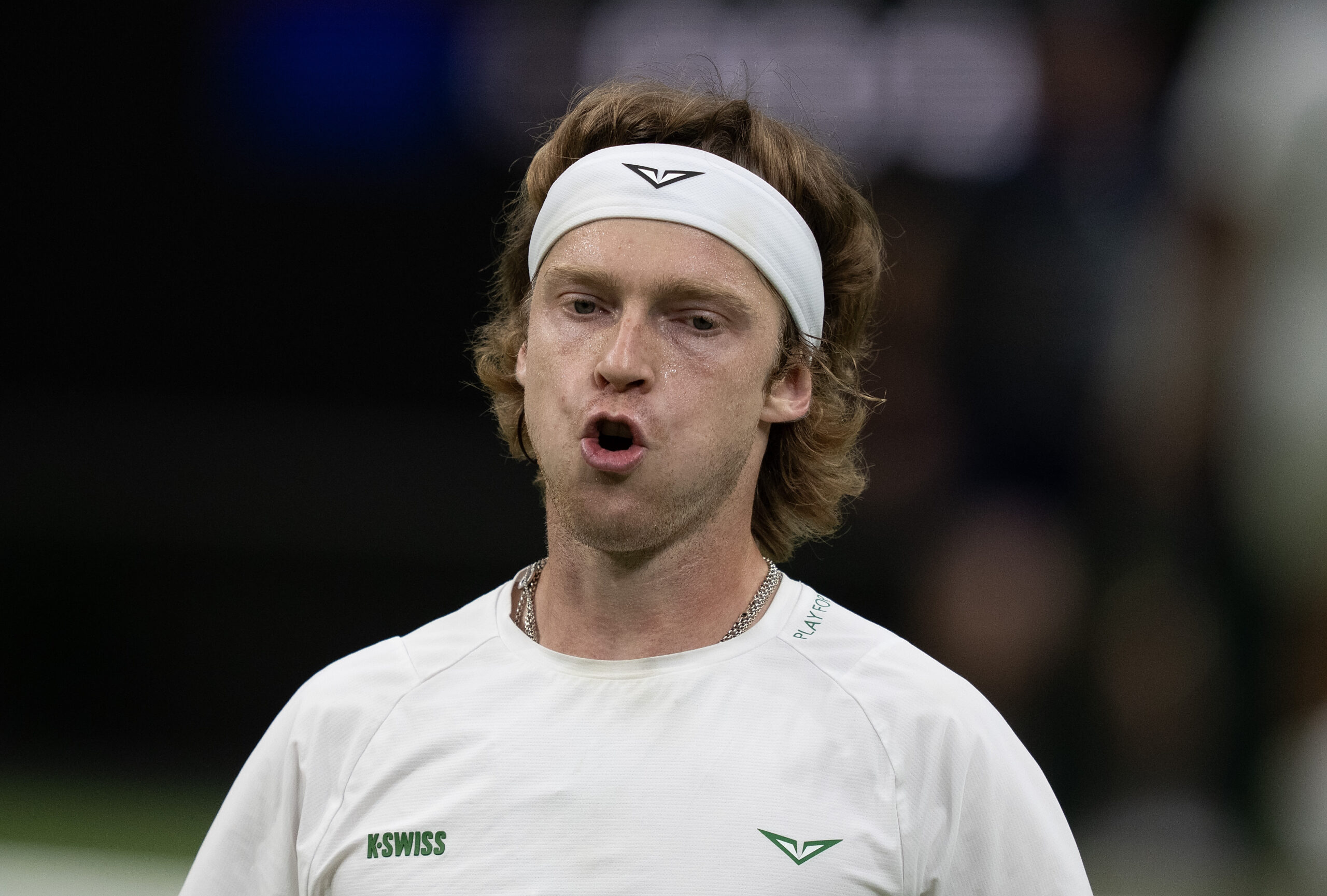 Jul 6, 2025; Wimbledon, United Kingdom; Andrey Rublev reacts to a point during his match against Carlos Alcaraz of Spain on day seven at the All England Lawn Tennis and Croquet Club. Mandatory Credit: Susan Mullane-Imagn Images