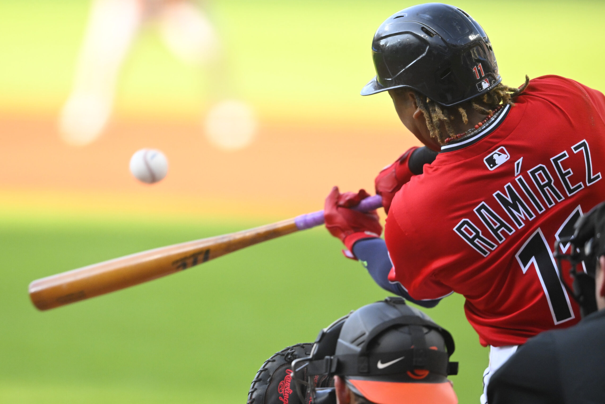 Jul 21, 2025; Cleveland, Ohio, USA; Cleveland Guardians third baseman Jose Ramirez (11) hits a three-run home run in the first inning against the Baltimore Orioles at Progressive Field. Mandatory Credit: David Richard-Imagn Images