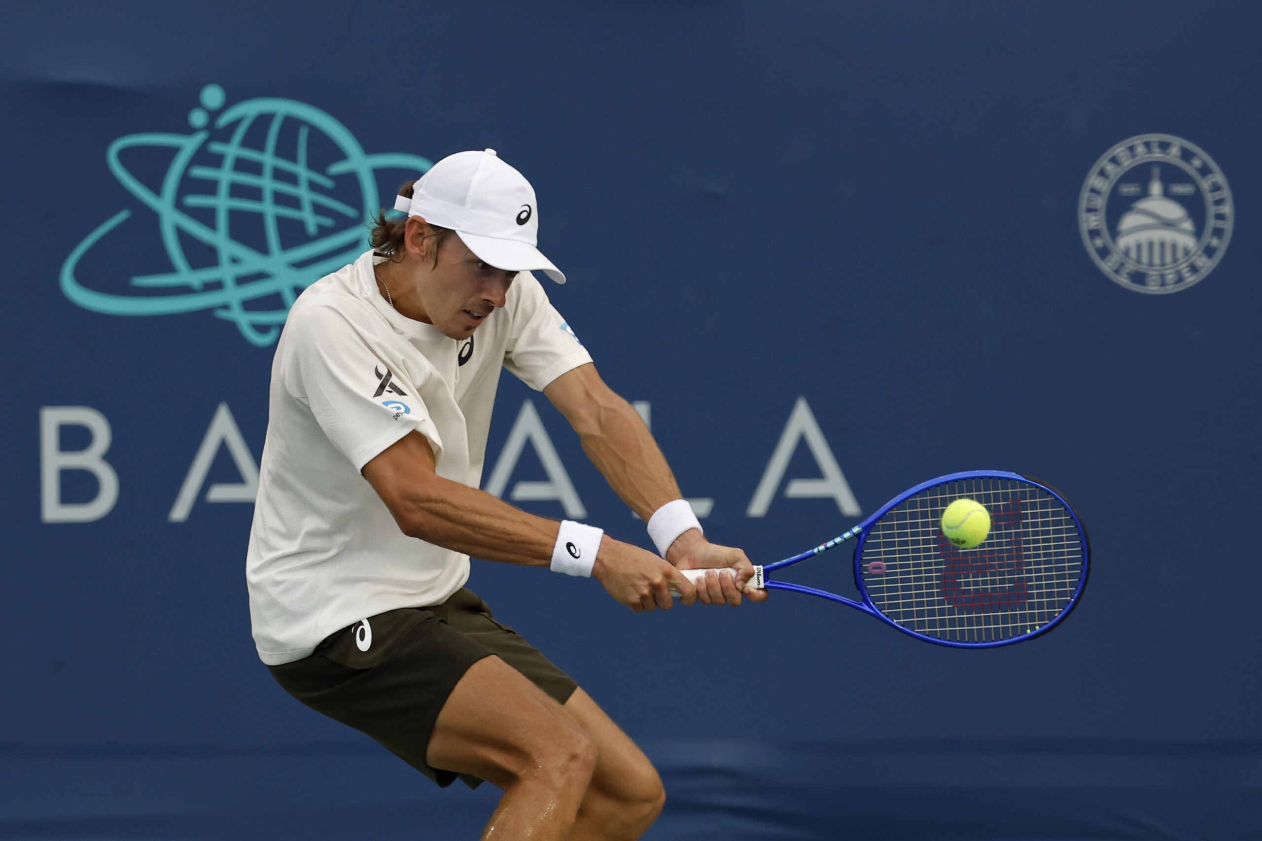 Jul 25, 2025; Washington, D.C., USA; Alex de Minaur (AUS) hits a backhand against Brandon Nakashima (USA)(not pictured) in a men's singles quarter final of the Mubadala Citi DC Open at Rock Creek Park Tennis Center. Mandatory Credit: Geoff Burke-Imagn Images