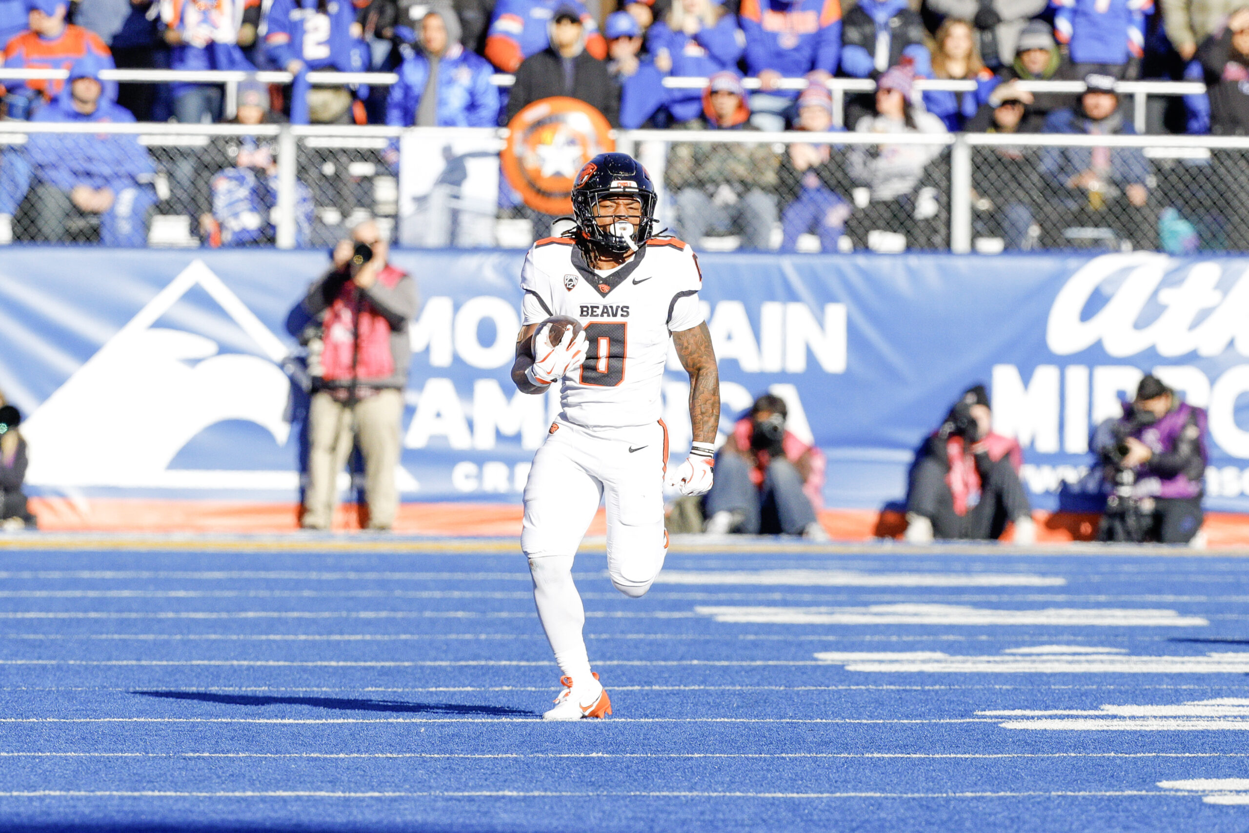 Nov 29, 2024; Boise, Idaho, USA; Oregon State Beavers running back Anthony Hankerson (0) runs for an 83 yard touchdown during the second quarter against the Boise State Broncos at Albertsons Stadium. Mandatory Credit: Brian Losness-Imagn Images