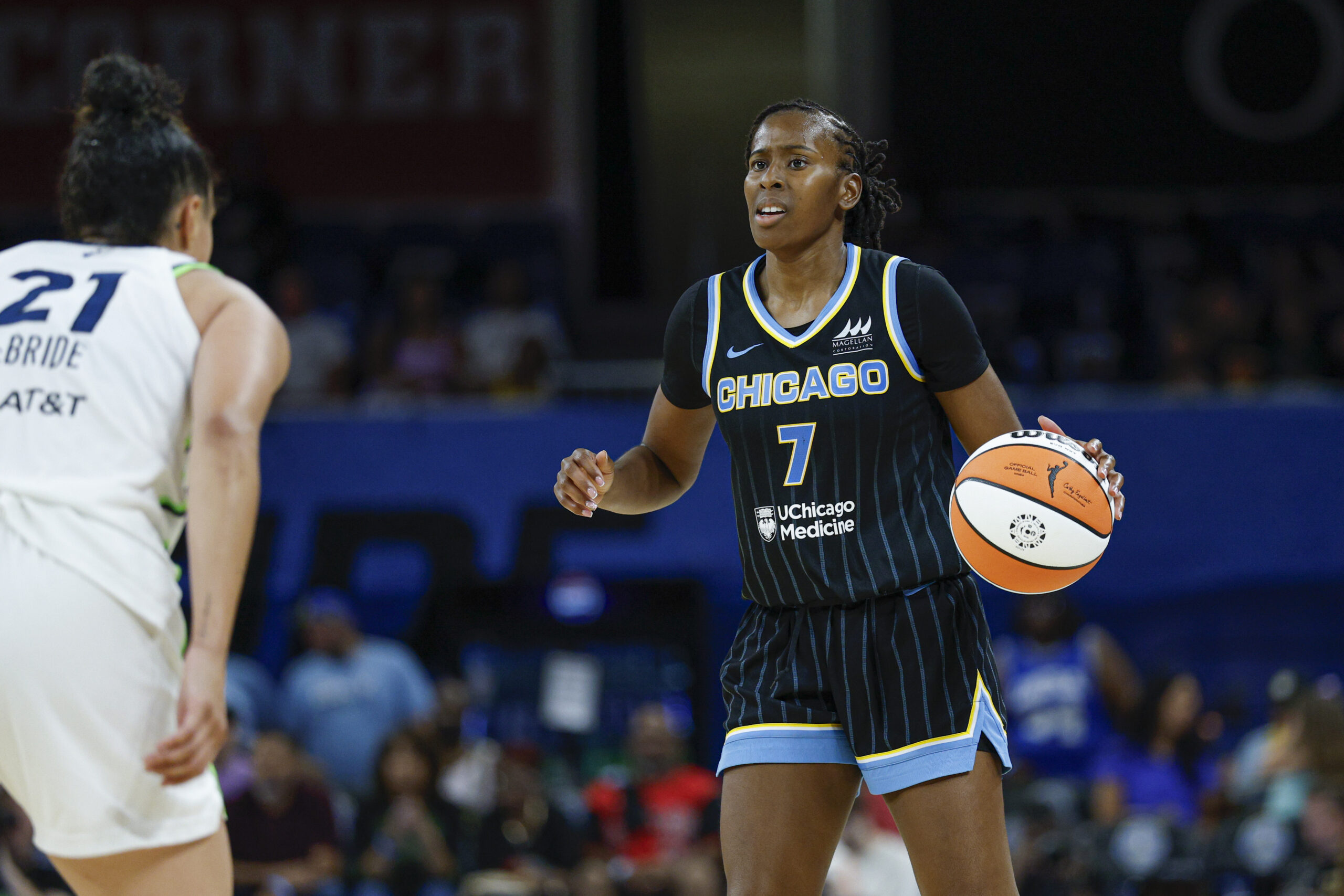 Jul 12, 2025; Chicago, Illinois, USA; Chicago Sky guard Ariel Atkins (7) brings the ball up court against the Minnesota Lynx during the second half of a WNBA game at Wintrust Arena. Mandatory Credit: Kamil Krzaczynski-Imagn Images