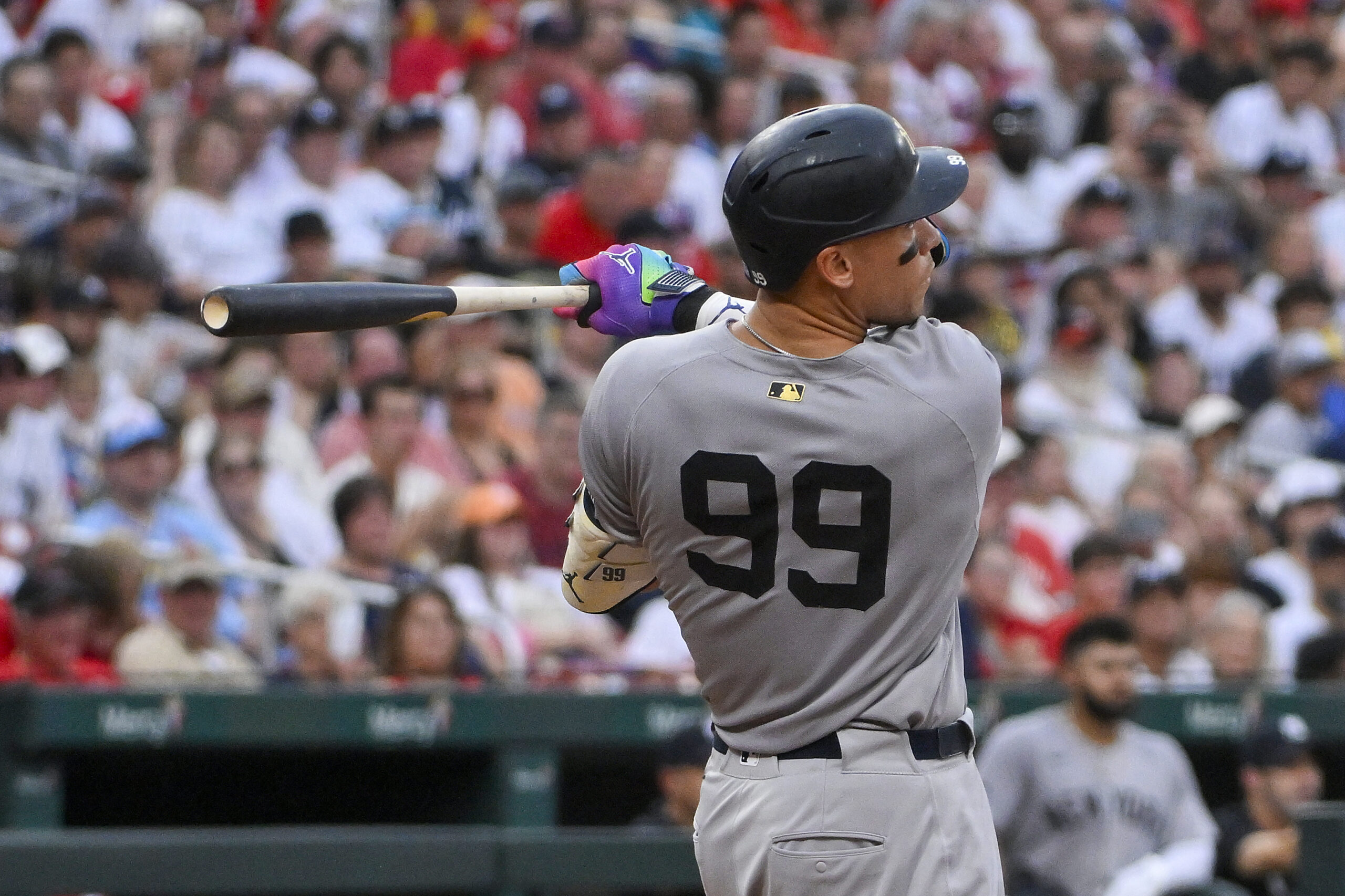 Aug 16, 2025; St. Louis, Missouri, USA; New York Yankees designated hitter Aaron Judge (99) hits a solo home run against the St. Louis Cardinals during the third inning at Busch Stadium. Mandatory Credit: Jeff Curry-Imagn Images
