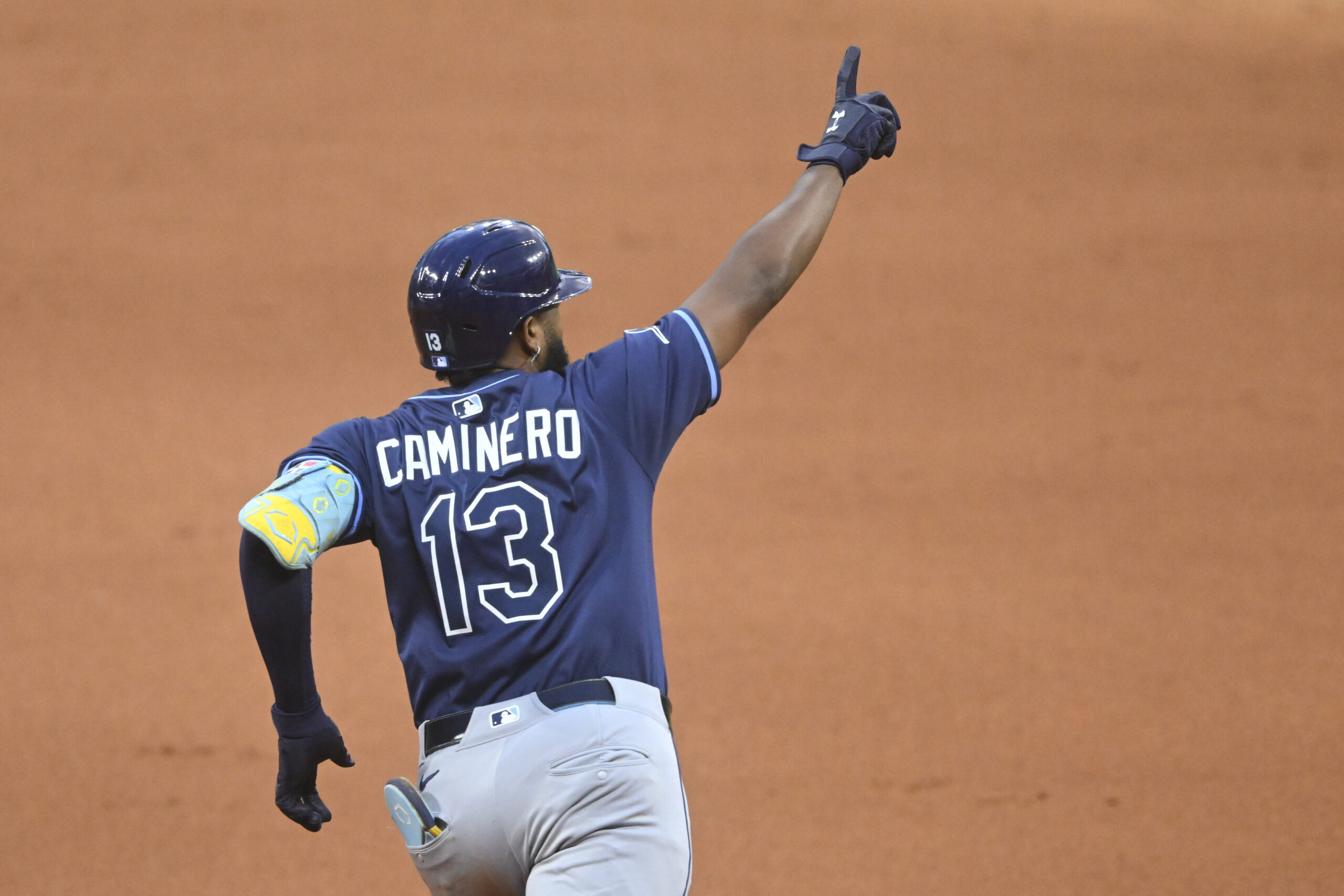 Aug 25, 2025; Cleveland, Ohio, USA; Tampa Bay Rays third baseman Junior Caminero (13) celebrates his two-run home run in the fifth inning against the Cleveland Guardians at Progressive Field. Mandatory Credit: David Richard-Imagn Images
