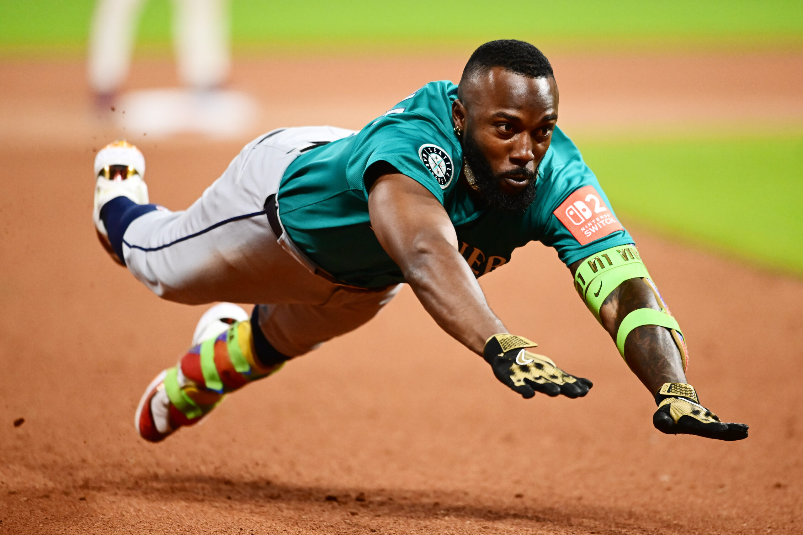 Aug 29, 2025; Cleveland, Ohio, USA; Seattle Mariners left fielder Randy Arozarena (56) tries to stretch a double into a triple against the Cleveland Guardians during the eighth inning at Progressive Field. Arozarena was out on the play. Mandatory Credit: Ken Blaze-Imagn Images
