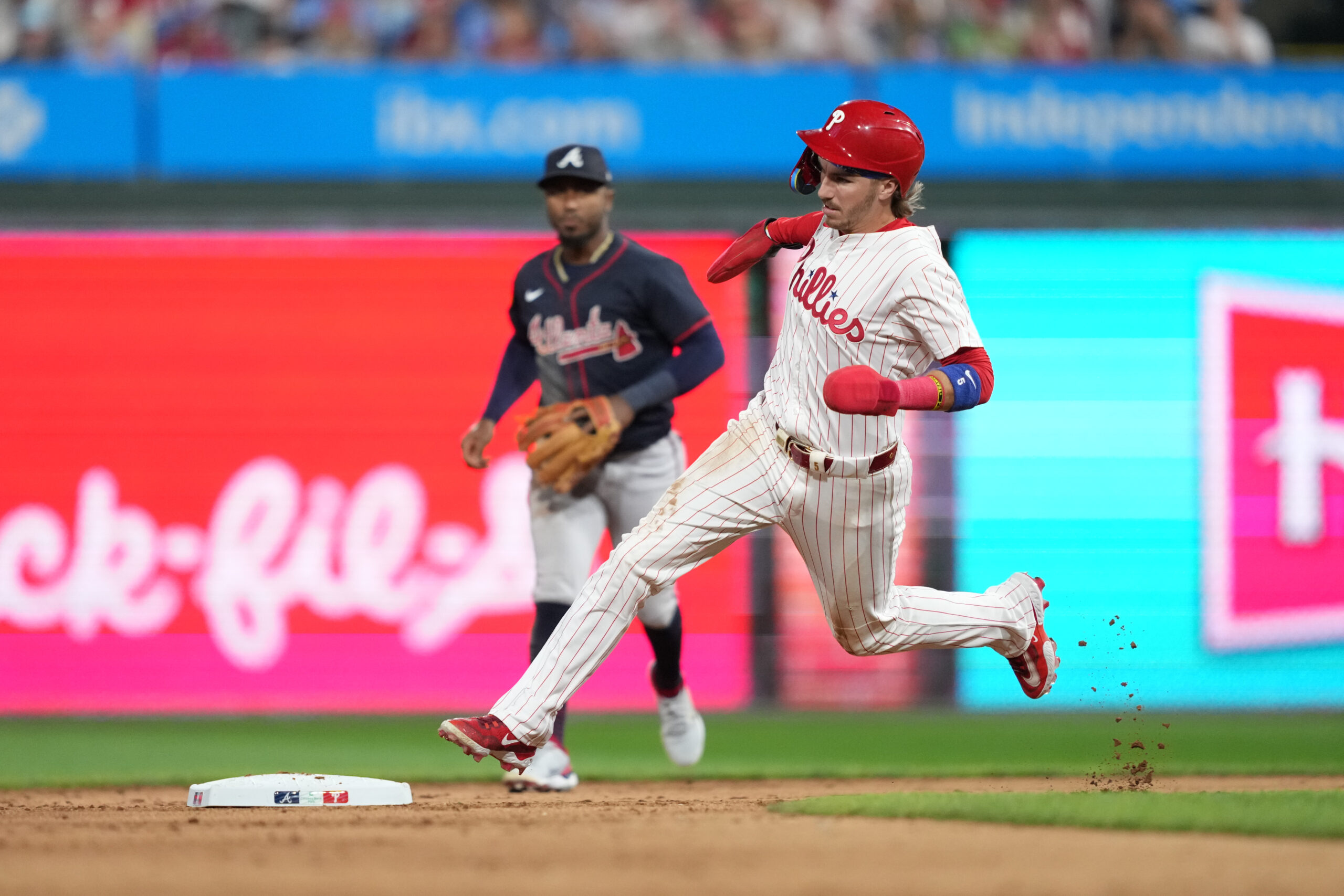 Aug 30, 2025; Philadelphia, Pennsylvania, USA; Philadelphia Phillies infielder Bryson Stott (5) rounds second base against the Atlanta Braves in the eighth inning at Citizens Bank Park. Mandatory Credit: Kyle Ross-Imagn Images
