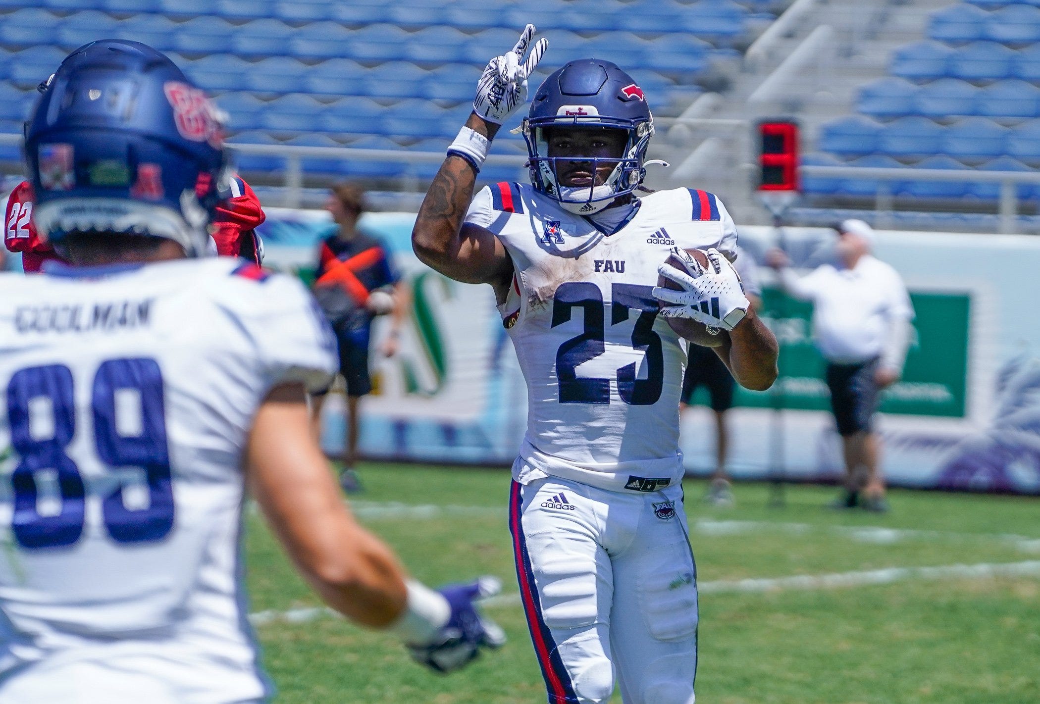 Running back Gemari Sands (23) celebrates a touchdown during the Spring Game at FAU Stadium on Saturday, April 13, 2024, in Boca Raton, FL.
