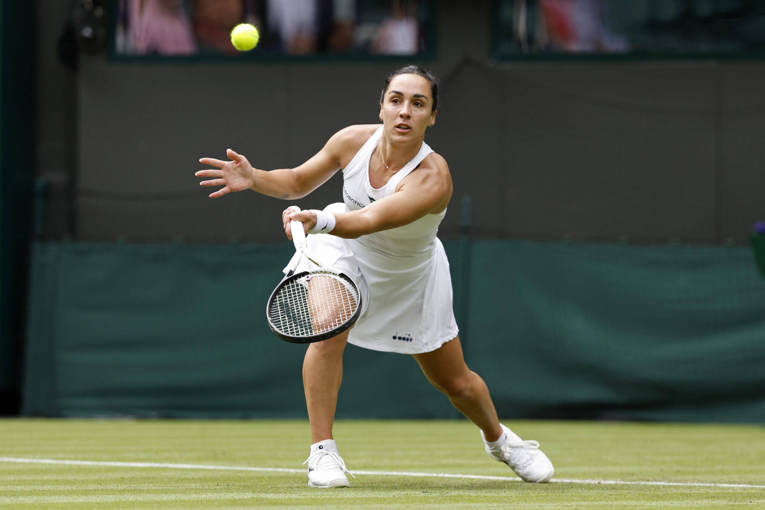 Jul 1, 2024; London, United Kingdom, Martina Trevisan (ITA) hits a forehand against Madison Keys (USA (not pictured) in a ladies singles match on day 1 in The Championships Wimbledon at the All England Lawn Tennis and Croquet Club. Mandatory Credit: Geoff Burke-Imagn Images