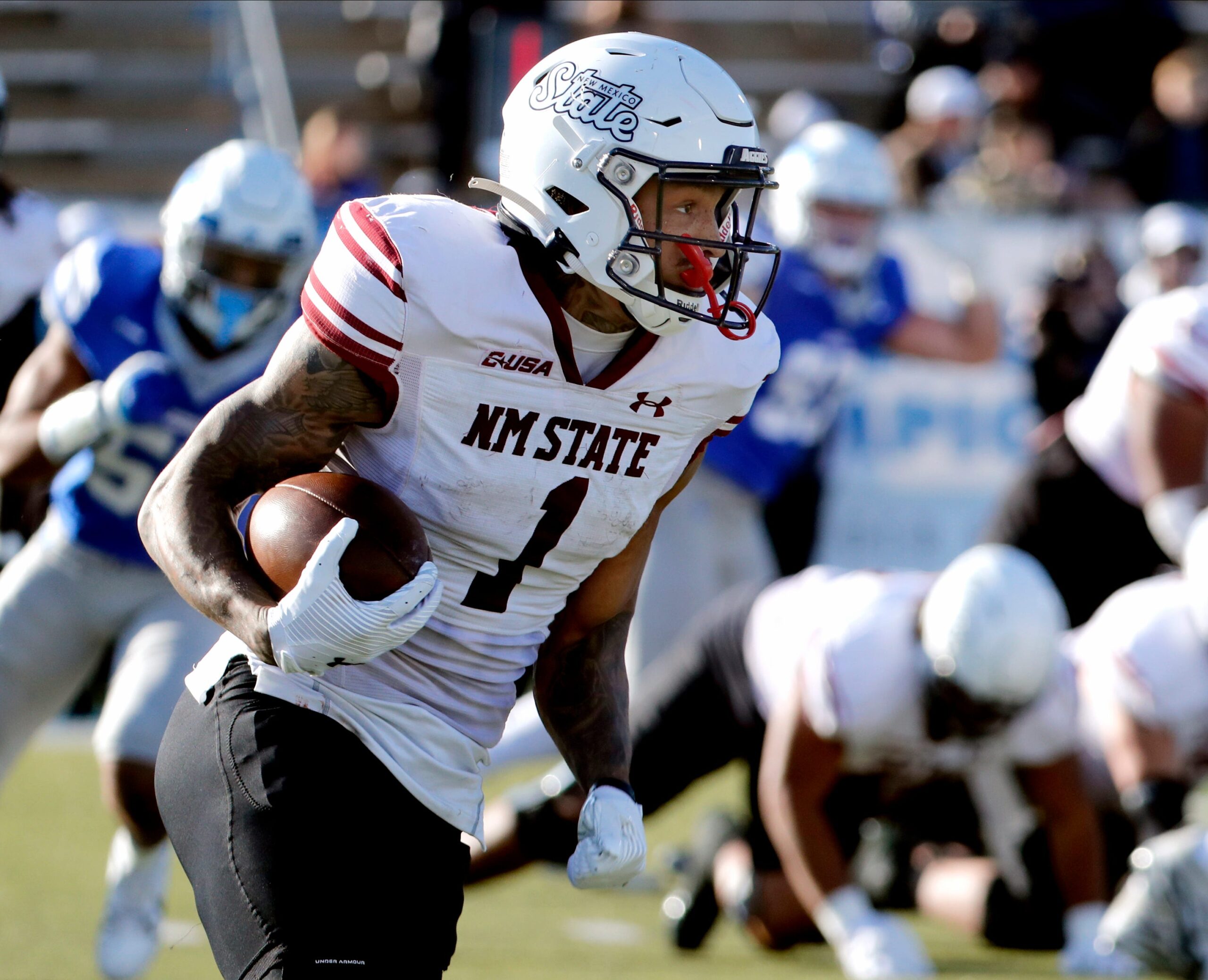 New Mexico State running back Seth McGowan (1) carries the ball during the season final home football game for Middle Tennessee, on Saturday, Nov. 23, 2024.