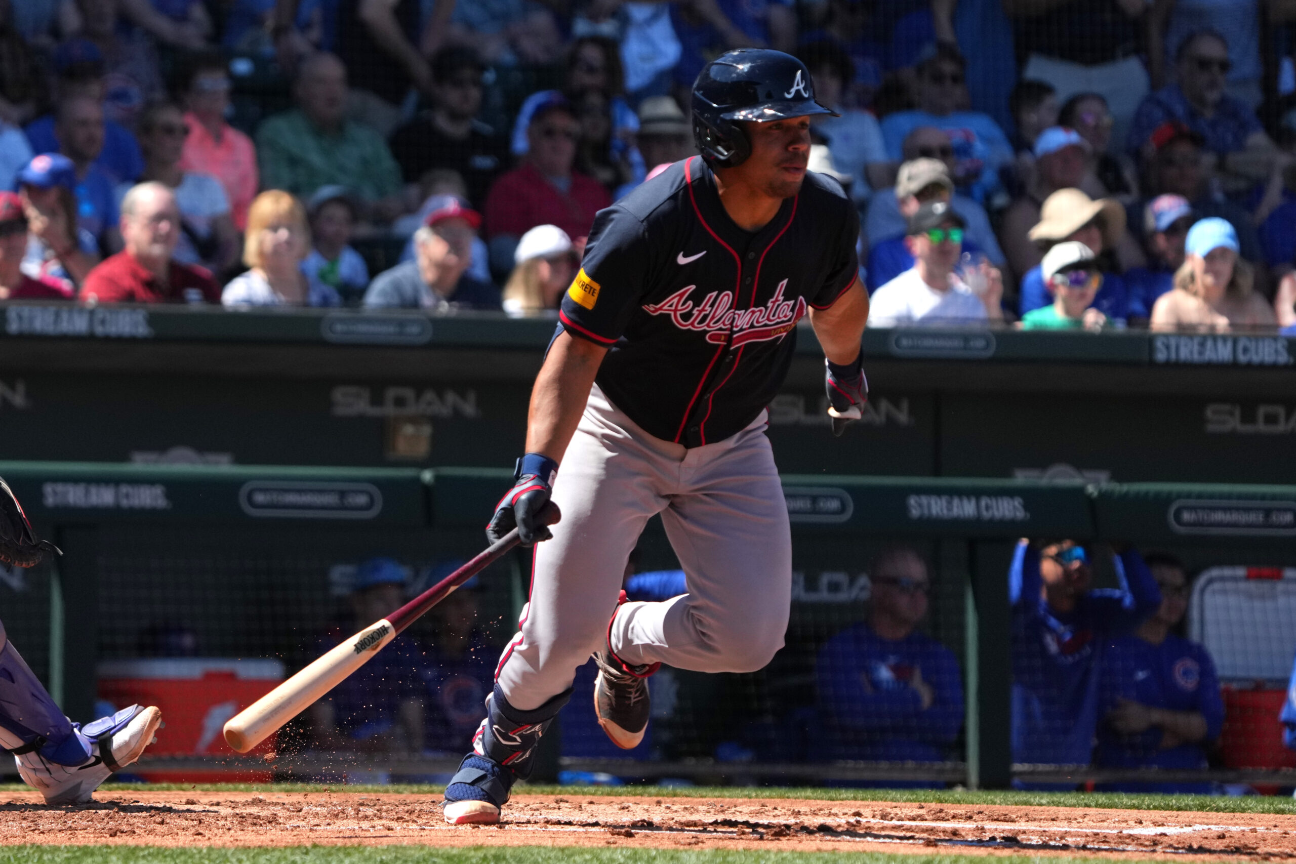 Mar 24, 2025; Mesa, Arizona, USA; Atlanta Braves catcher Drake Baldwin (75) hits an RBI single against the Chicago Cubs in the second inning at Sloan Park. Mandatory Credit: Rick Scuteri-Imagn Images