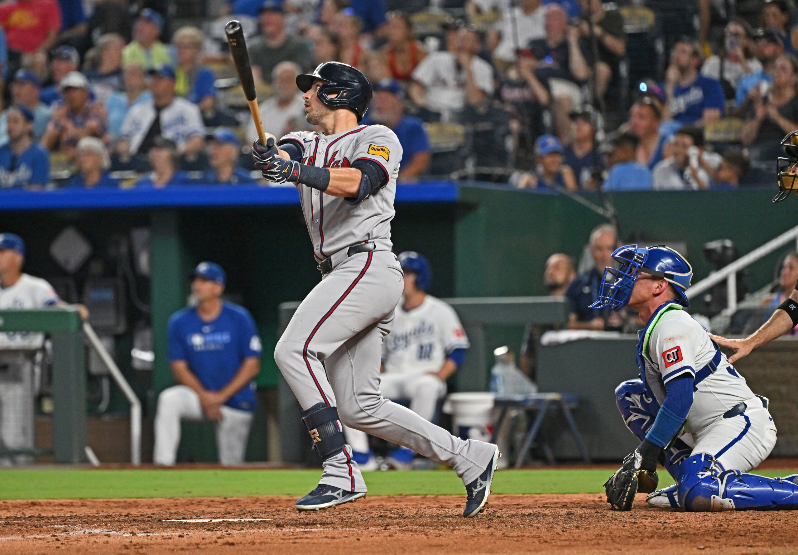 Jul 28, 2025; Kansas City, Missouri, USA; Atlanta Braves third baseman Austin Riley (27) hits a solo home run in the seventh inning against the Kansas City Royals at Kauffman Stadium. Mandatory Credit: Peter Aiken-Imagn Images