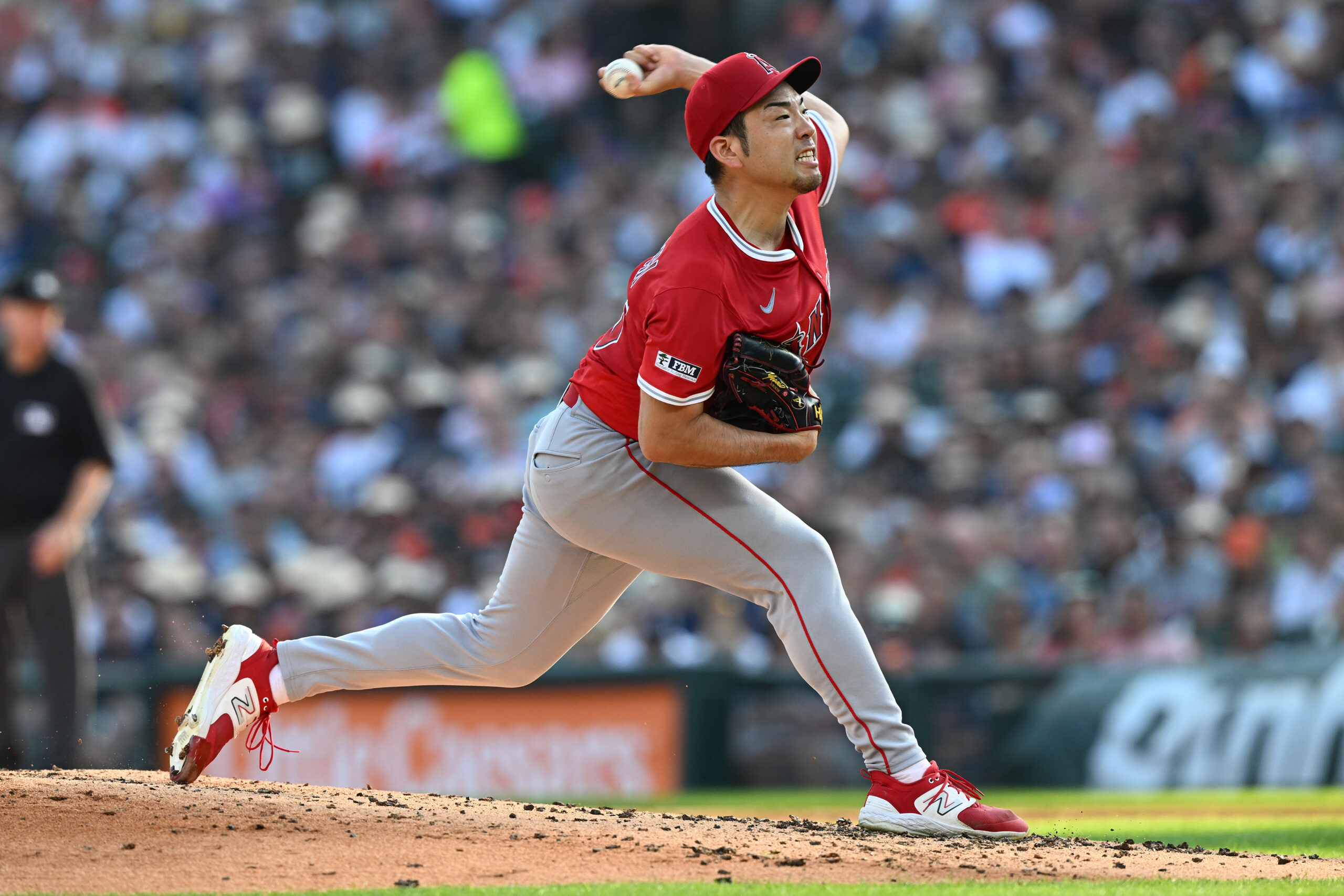 Aug 9, 2025; Detroit, Michigan, USA; Los Angeles Angels starting pitcher Yusei Kikuchi (16) throws a pitch against the Detroit Tigers in the second inning at Comerica Park. Mandatory Credit: Lon Horwedel-Imagn Images