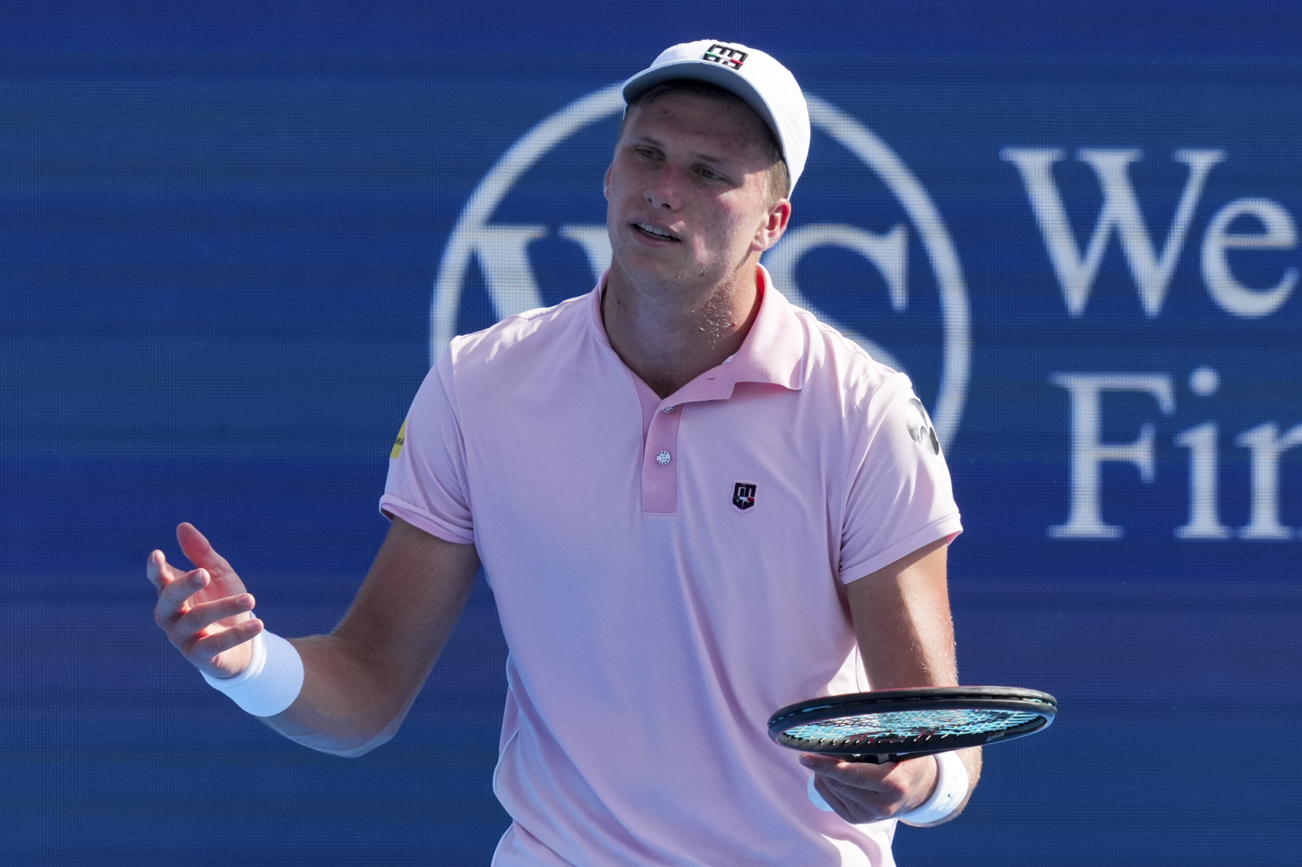 Aug 12, 2025; Cincinnati, OH, USA; Jenson Brooksby (USA) reacts after returning a shot against Karen Khachanov (RUS) during the Cincinnati Open at the Lindner Family Tennis Center. Mandatory Credit: Aaron Doster-Imagn Images