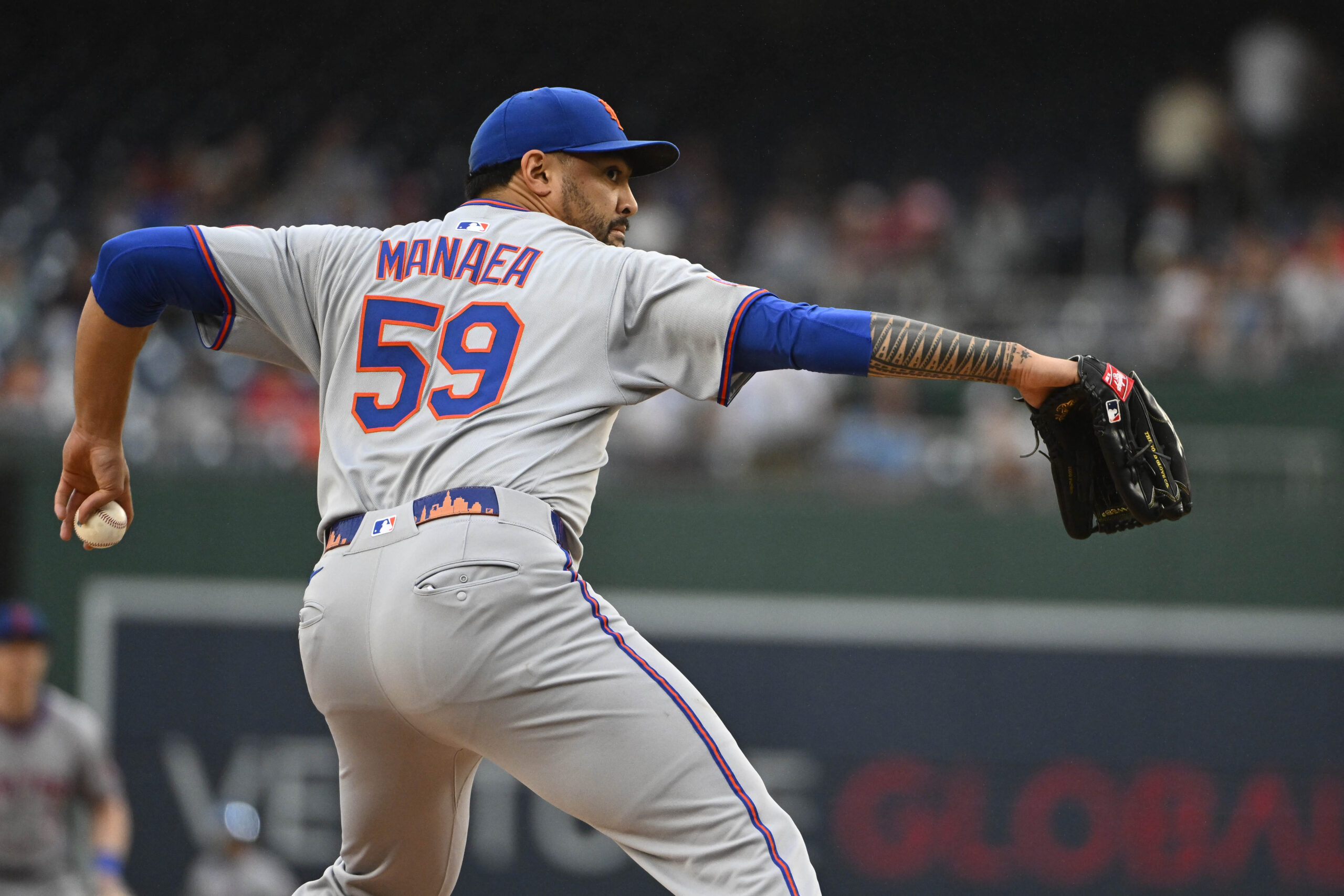 Aug 21, 2025; Washington, District of Columbia, USA; New York Mets starting pitcher Sean Manaea (59) throws to the Washington Nationals during the first inning at Nationals Park. Mandatory Credit: Brad Mills-Imagn Images