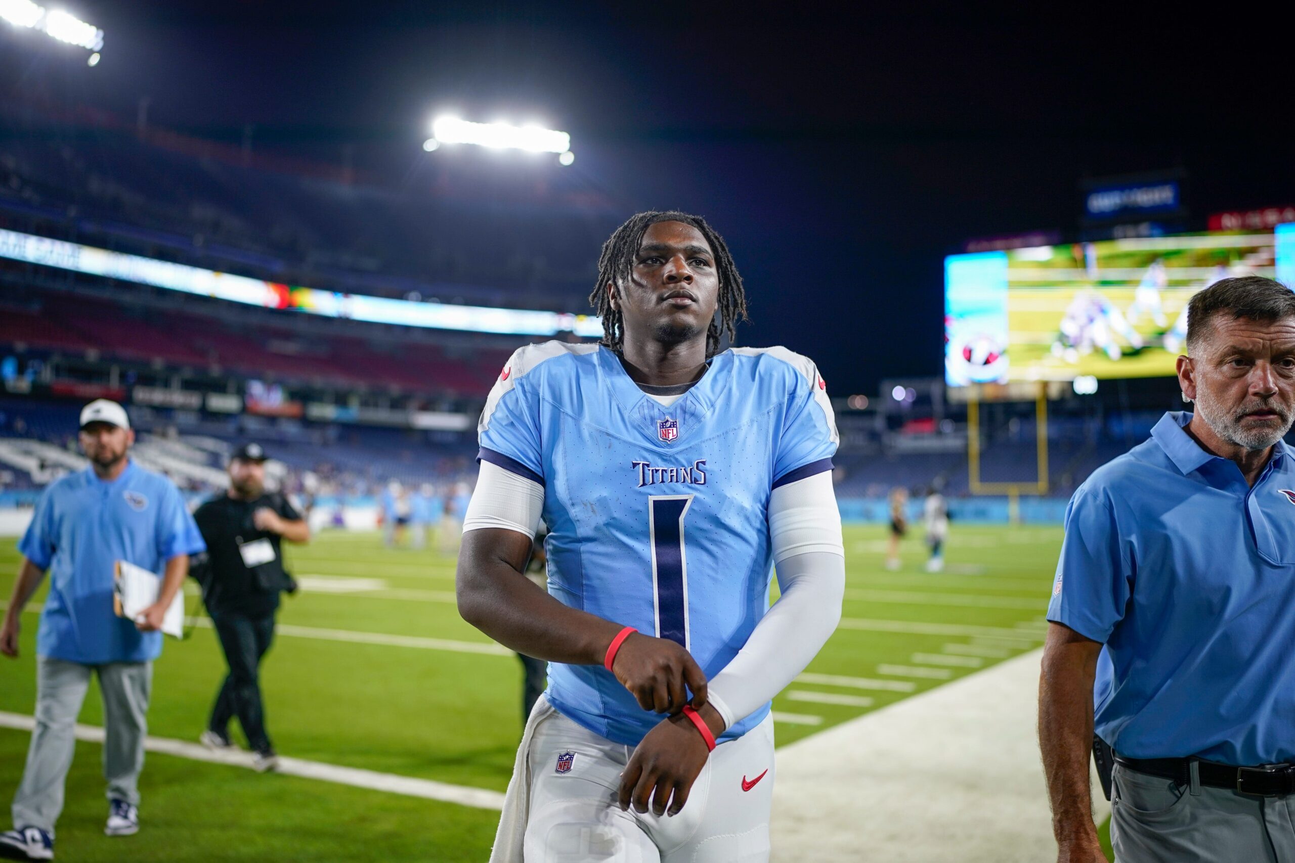 Tennessee Titans quarterback Cam Ward (1) exits the field after an NFL pre-season game against the Minnesota Vikings at Nissan Stadium in Nashville, Tenn., Friday, Aug. 22, 2025.