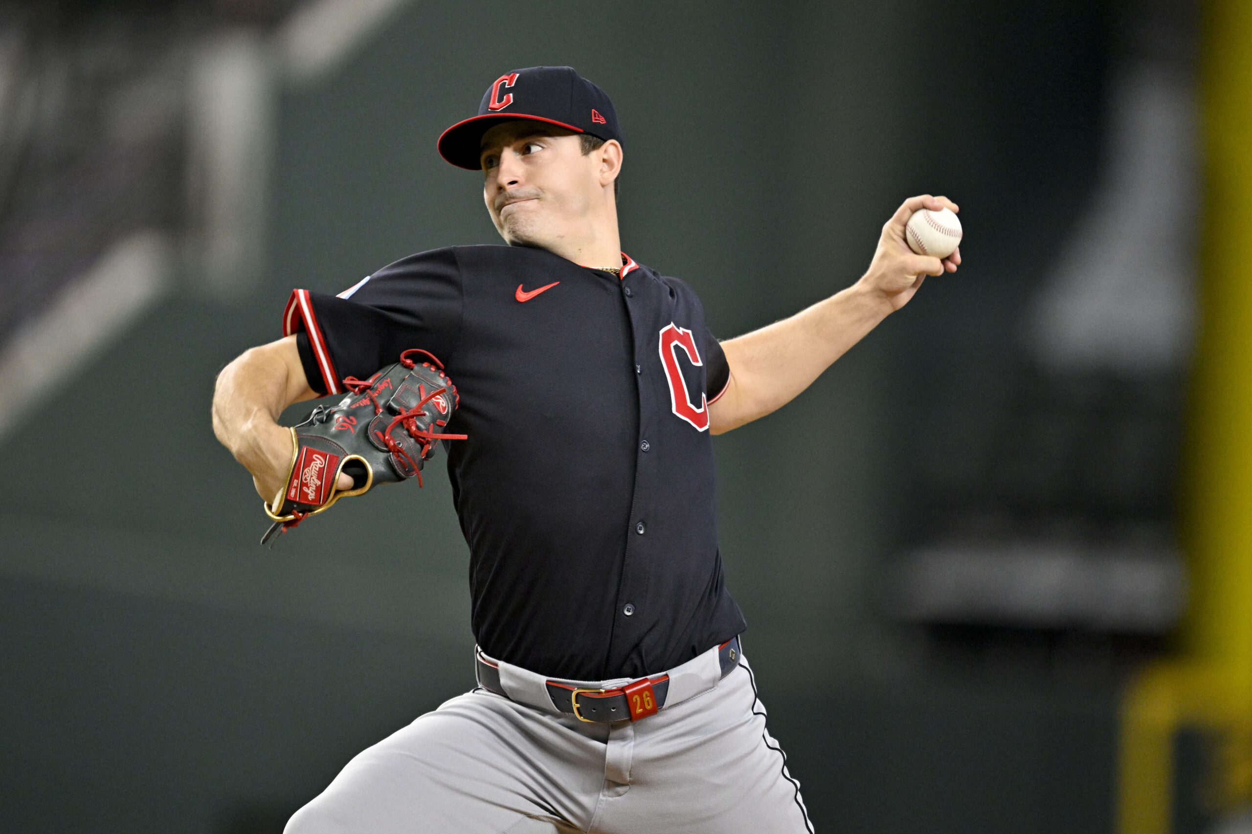 Aug 23, 2025; Arlington, Texas, USA; Cleveland Guardians starting pitcher Logan Allen (26) throws the ball during the first inning against the Texas Rangers at Globe Life Field. Mandatory Credit: Jerome Miron-Imagn Images