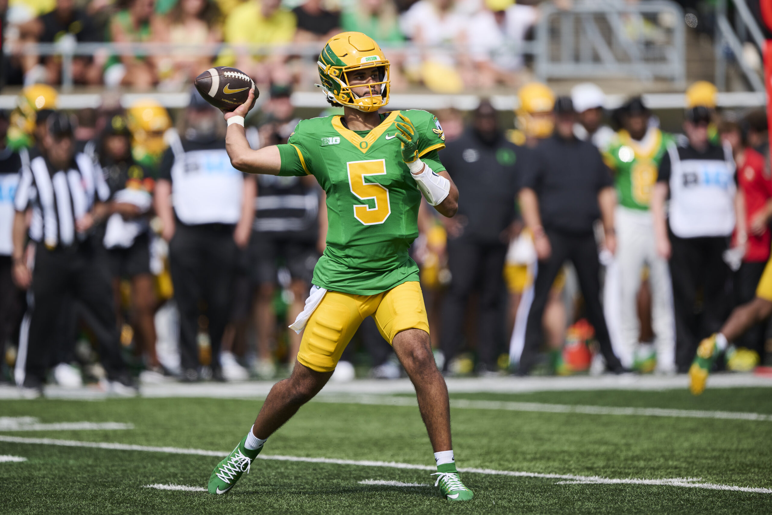 Aug 30, 2025; Eugene, Oregon, USA; Oregon Ducks quarterback Dante Moore (5) throws the football during the second half against the Montana State Bobcats at Autzen Stadium. Mandatory Credit: Troy Wayrynen-Imagn Images