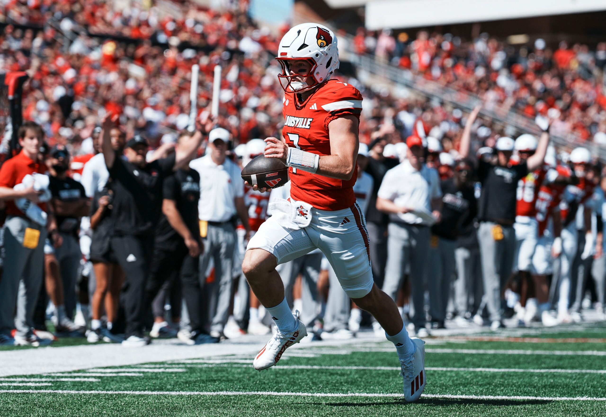 Louisville Cardinals quarterback Miller Moss (7) scores on this touchdown run in the first quarter during the Cards' 51-17 win over Eastern Kentucky University at the Cardinals' season opener Saturday, August 30, 2025 at L&N Federal Credit Union Stadium in Louisville, Kentucky.