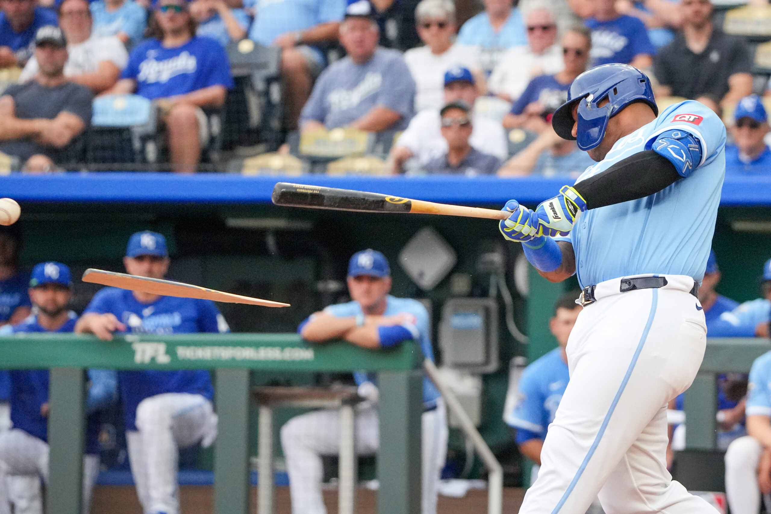 Aug 31, 2025; Kansas City, Missouri, USA; Kansas City Royals designated hitter Salvador Perez (13) breaks his bat  hitting a single against the Detroit Tigers during the ninth inning at Kauffman Stadium. Mandatory Credit: Denny Medley-Imagn Images