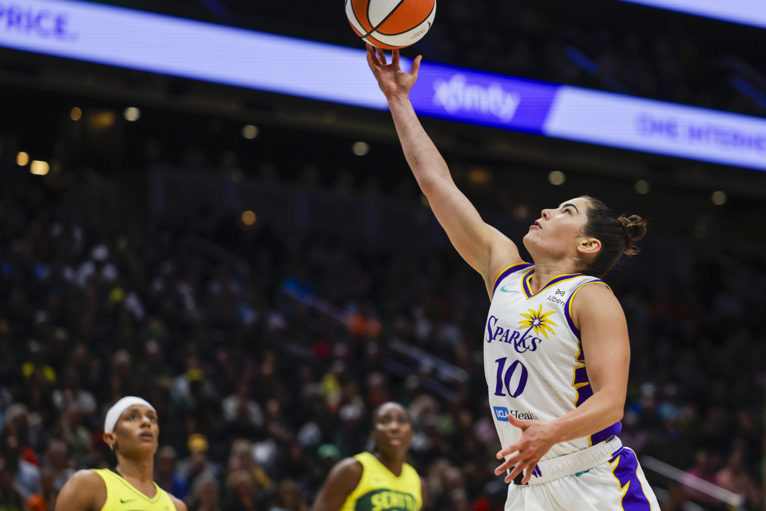 Sep 1, 2025; Seattle, Washington, USA; Los Angeles Sparks guard Kelsey Plum (10) shoots a layup against the Seattle Storm during the third quarter at Climate Pledge Arena. Mandatory Credit: Joe Nicholson-Imagn Images