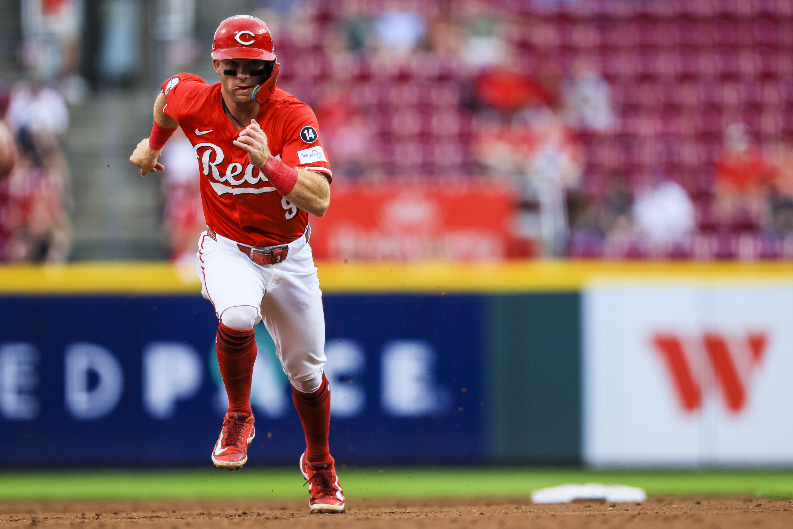 Sep 2, 2025; Cincinnati, Ohio, USA; Cincinnati Reds second baseman Matt McLain (9) runs to third on a ground out hit by outfielder TJ Friedl (not pictured) in the second inning against the Toronto Blue Jays at Great American Ball Park. Mandatory Credit: Katie Stratman-Imagn Images