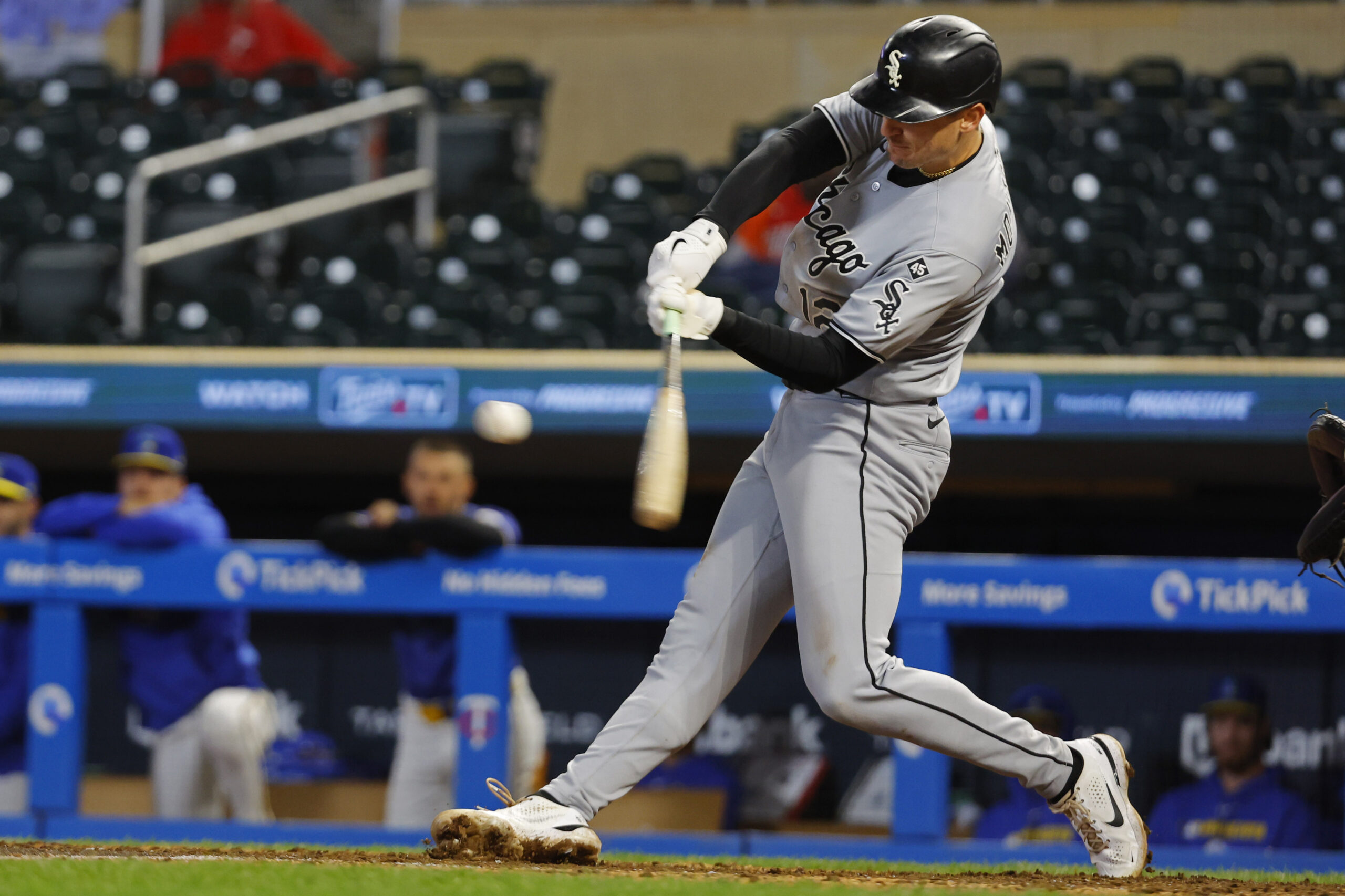 Sep 4, 2025; Minneapolis, Minnesota, USA; Chicago White Sox shortstop Colson Montgomery (12) hits a two-run home run against the Minnesota Twins in the ninth inning at Target Field. Mandatory Credit: Bruce Kluckhohn-Imagn Images