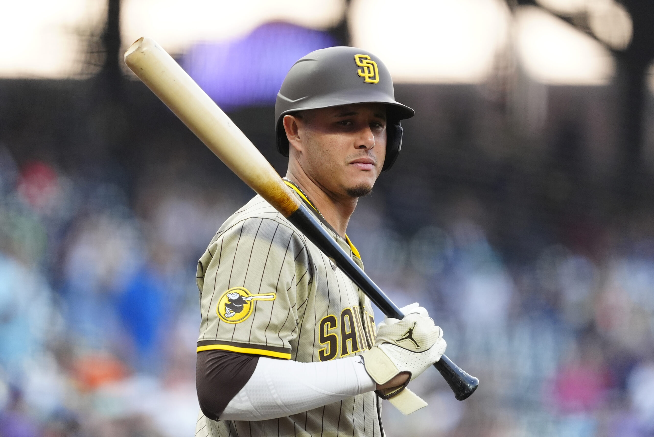 Sep 5, 2025; Denver, Colorado, USA; San Diego Padres third baseman Manny Machado (13) during the first inning against the Colorado Rockies at Coors Field. Mandatory Credit: Ron Chenoy-Imagn Images
