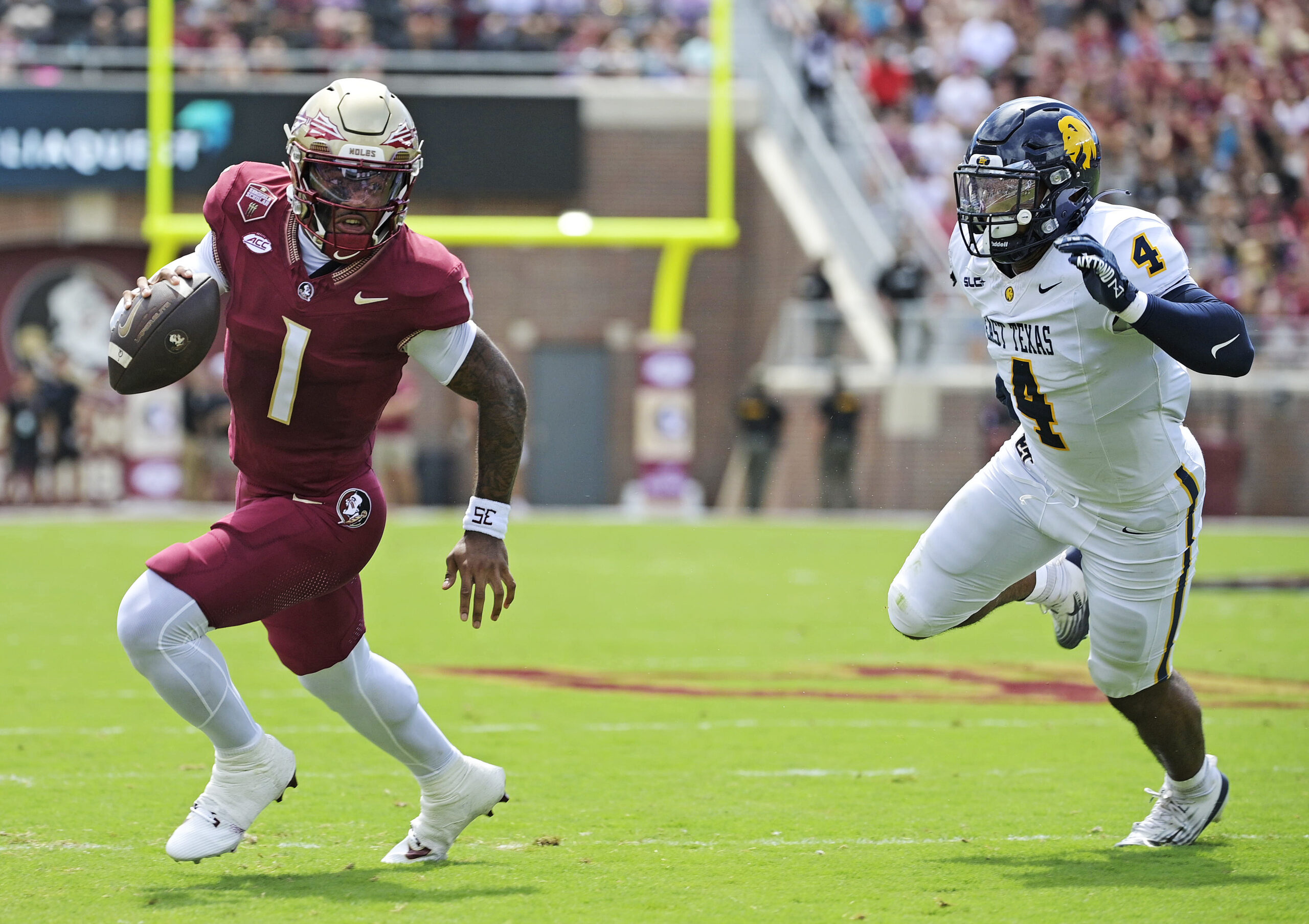Sep 6, 2025; Tallahassee, Florida, USA; Florida State Seminoles quarterback Tommy Castellanos (1) runs the ball during the first half against the East Texas A&M Lions at Doak S. Campbell Stadium. Mandatory Credit: Melina Myers-Imagn Images