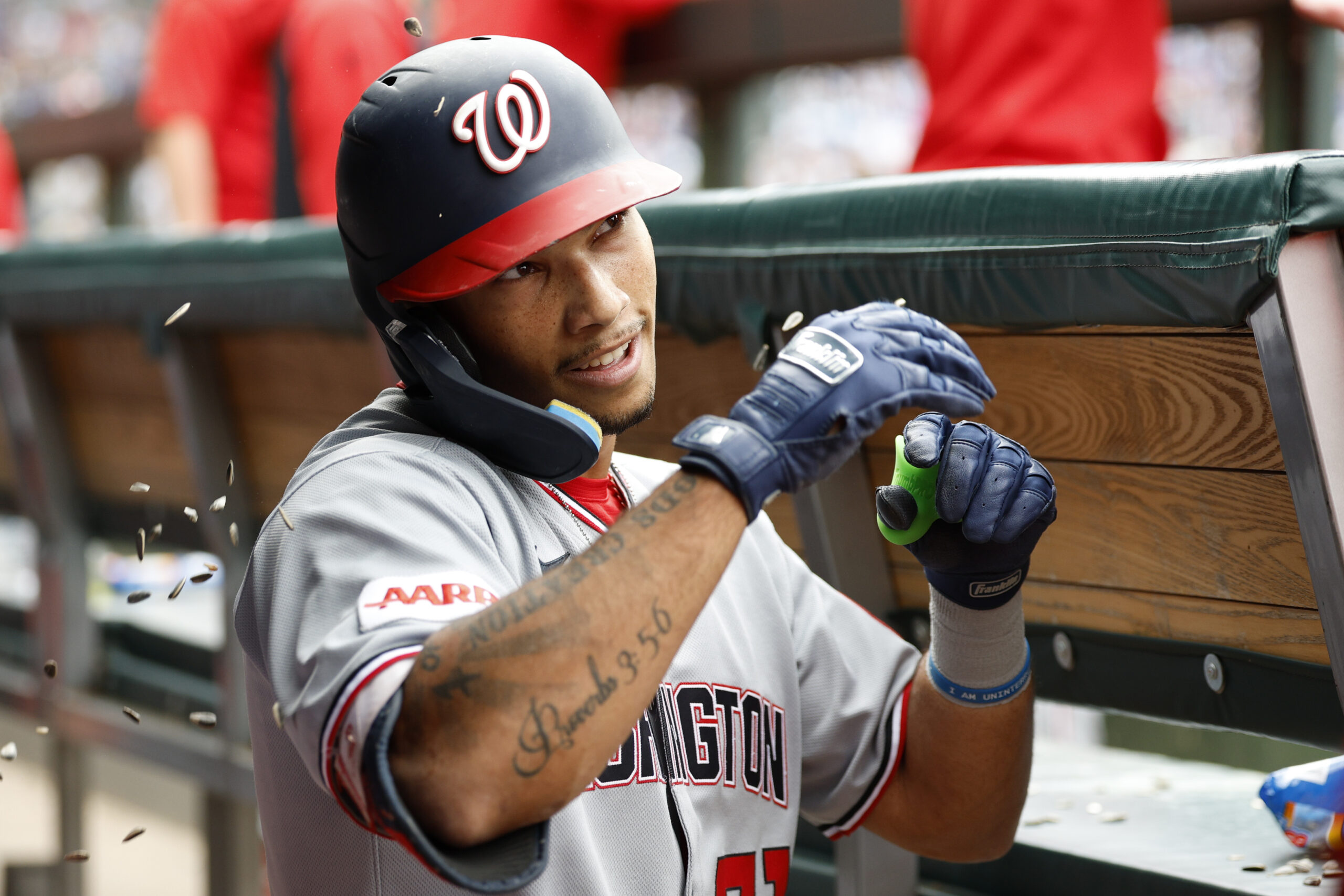 Sep 6, 2025; Chicago, Illinois, USA; Washington Nationals left fielder Daylen Lile (51) celebrates with teammates in the dugout after hitting a solo home run against the Chicago Cubs during the fourth inning at Wrigley Field. Mandatory Credit: Kamil Krzaczynski-Imagn Images