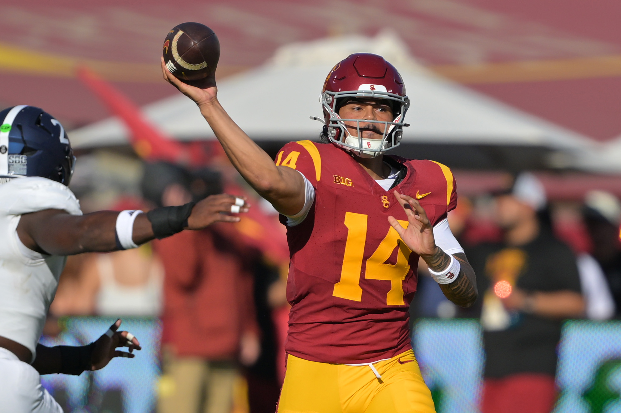 Sep 6, 2025; Los Angeles, California, USA;  USC Trojans quarterback Jayden Maiava (14) throws a pass during the first half against the Georgia Southern Eagles at United Airlines Field at Los Angeles Memorial Coliseum. Mandatory Credit: Jayne Kamin-Oncea-Imagn Images