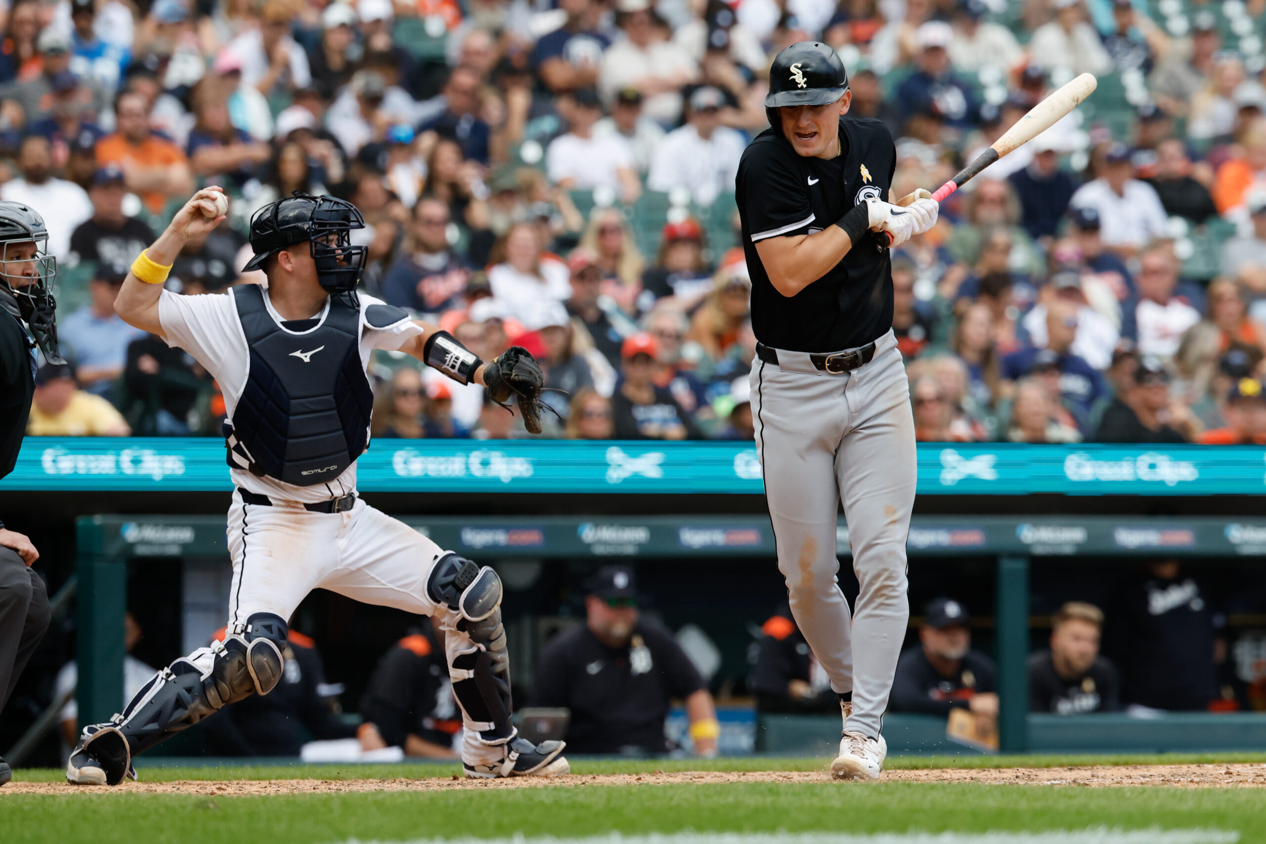 Sep 7, 2025; Detroit, Michigan, USA; Detroit Tigers catcher Jake Rogers (34) makes a throw to third in the eighth inning against the Chicago White Sox at Comerica Park. Mandatory Credit: Rick Osentoski-Imagn Images