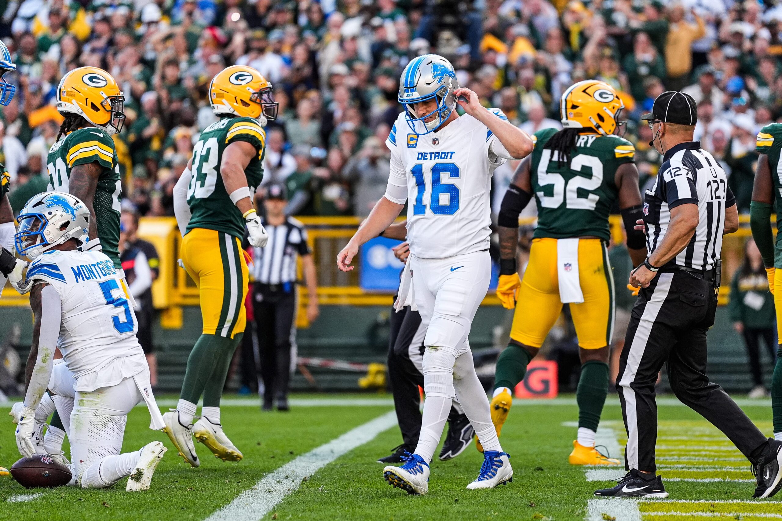 Detroit Lions quarterback Jared Goff walks off the field after a failed third-down conversion against the Green Bay Packers during the second half at Lambeau Field in Green Bay, Wis., on Sunday, September 7, 2025.