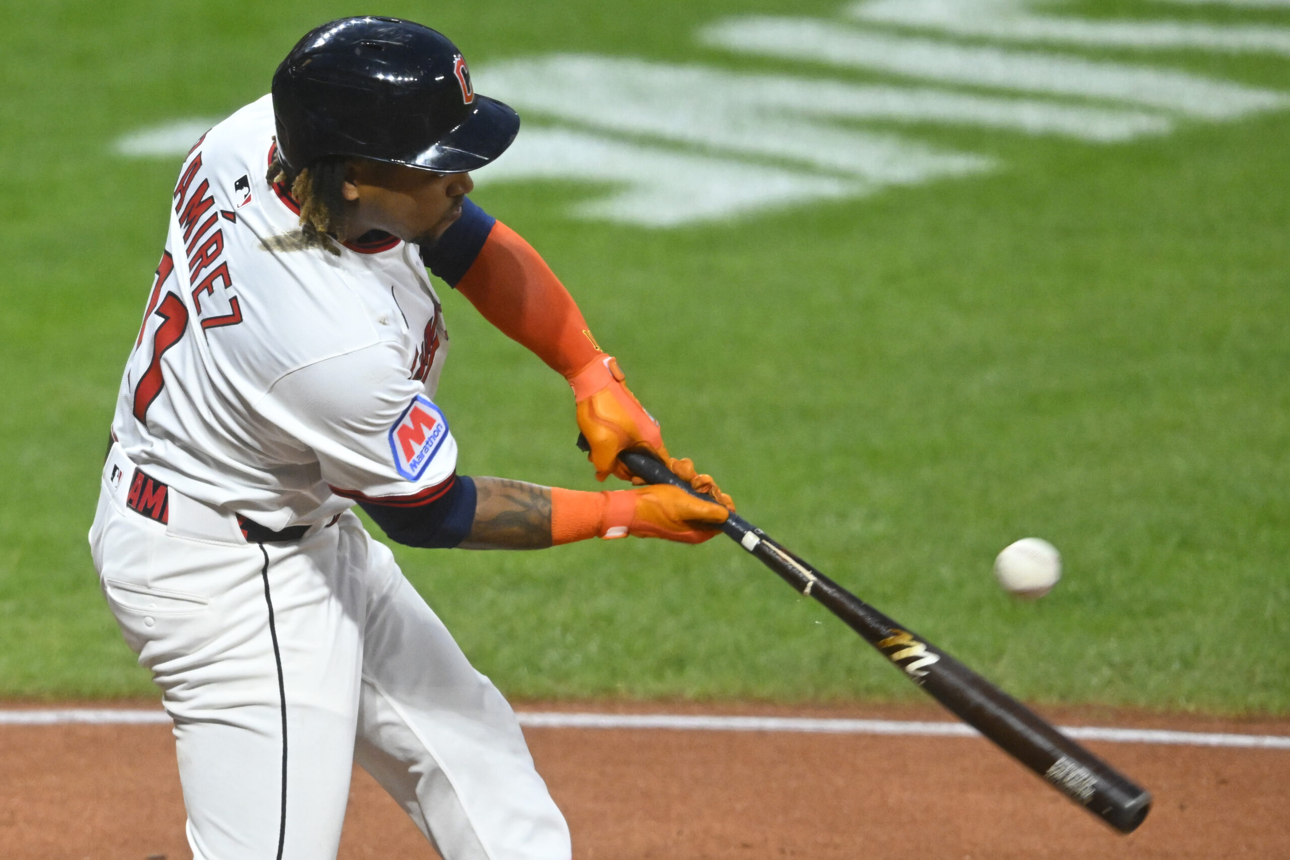 Sep 9, 2025; Cleveland, Ohio, USA; Cleveland Guardians third baseman Jose Ramirez (11) singles in the sixth inning against the Kansas City Royals at Progressive Field. Mandatory Credit: David Richard-Imagn Images