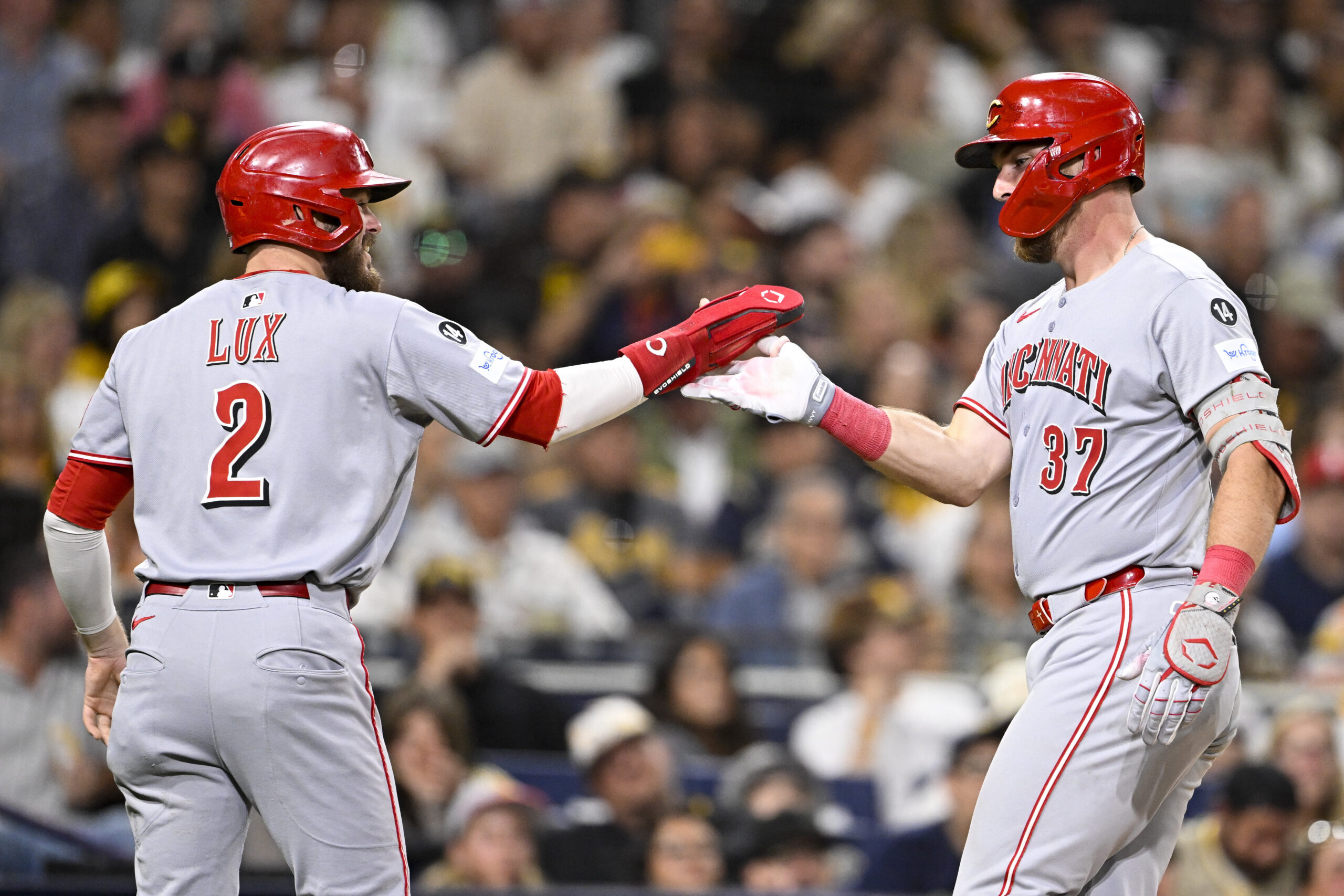 Sep 9, 2025; San Diego, California, USA; Cincinnati Reds catcher Tyler Stephenson (37) is congratulated by Gavin Lux (2) after hitting a two-run home run during the ninth inning against the San Diego Padres at Petco Park. Mandatory Credit: Denis Poroy-Imagn Images