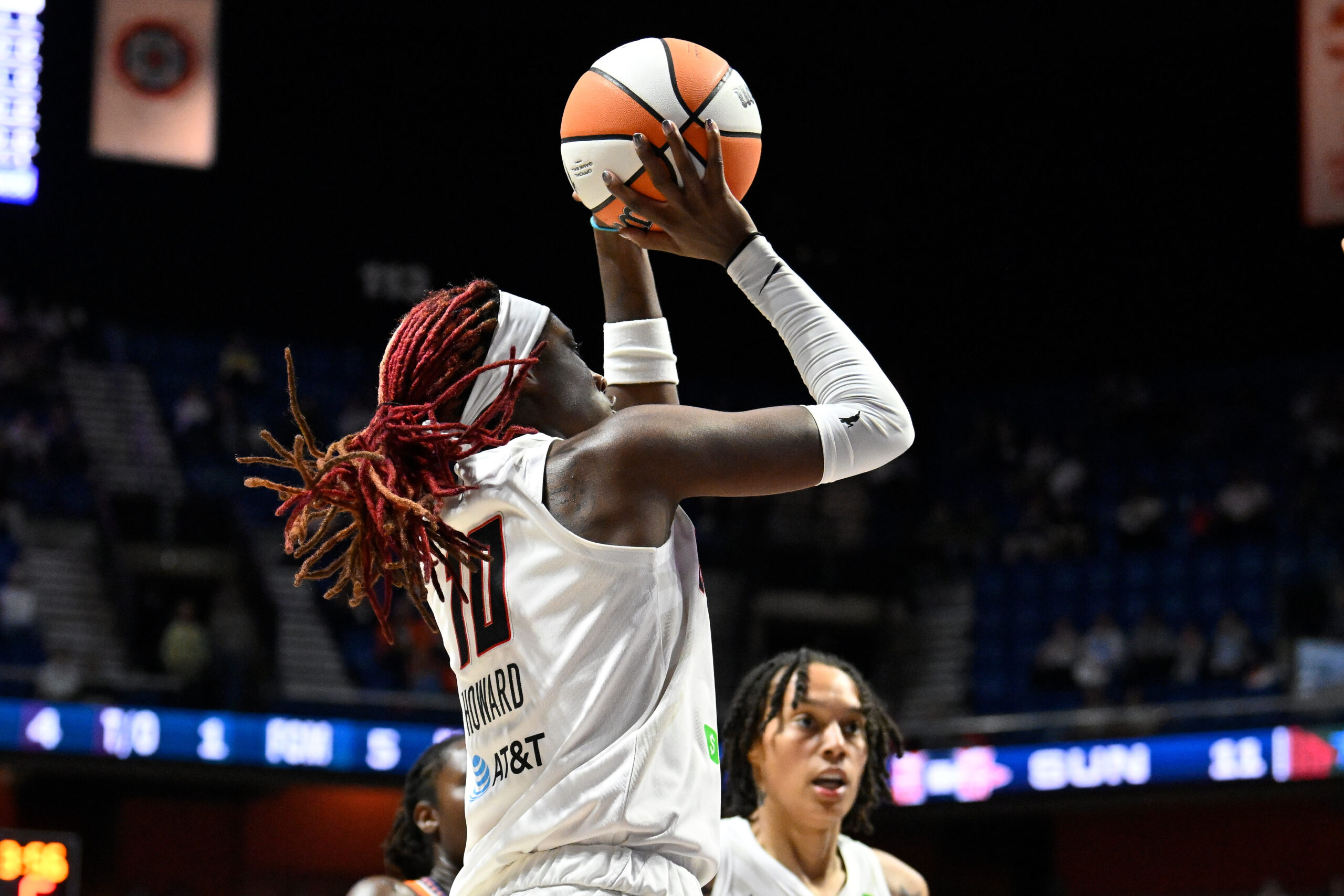 Sep 10, 2025; Uncasville, Connecticut, USA; Atlanta Dream guard Rhyne Howard (10) shoots the ball against the Connecticut Sun during the first half at Mohegan Sun Arena. Mandatory Credit: Eric Canha-Imagn Images
